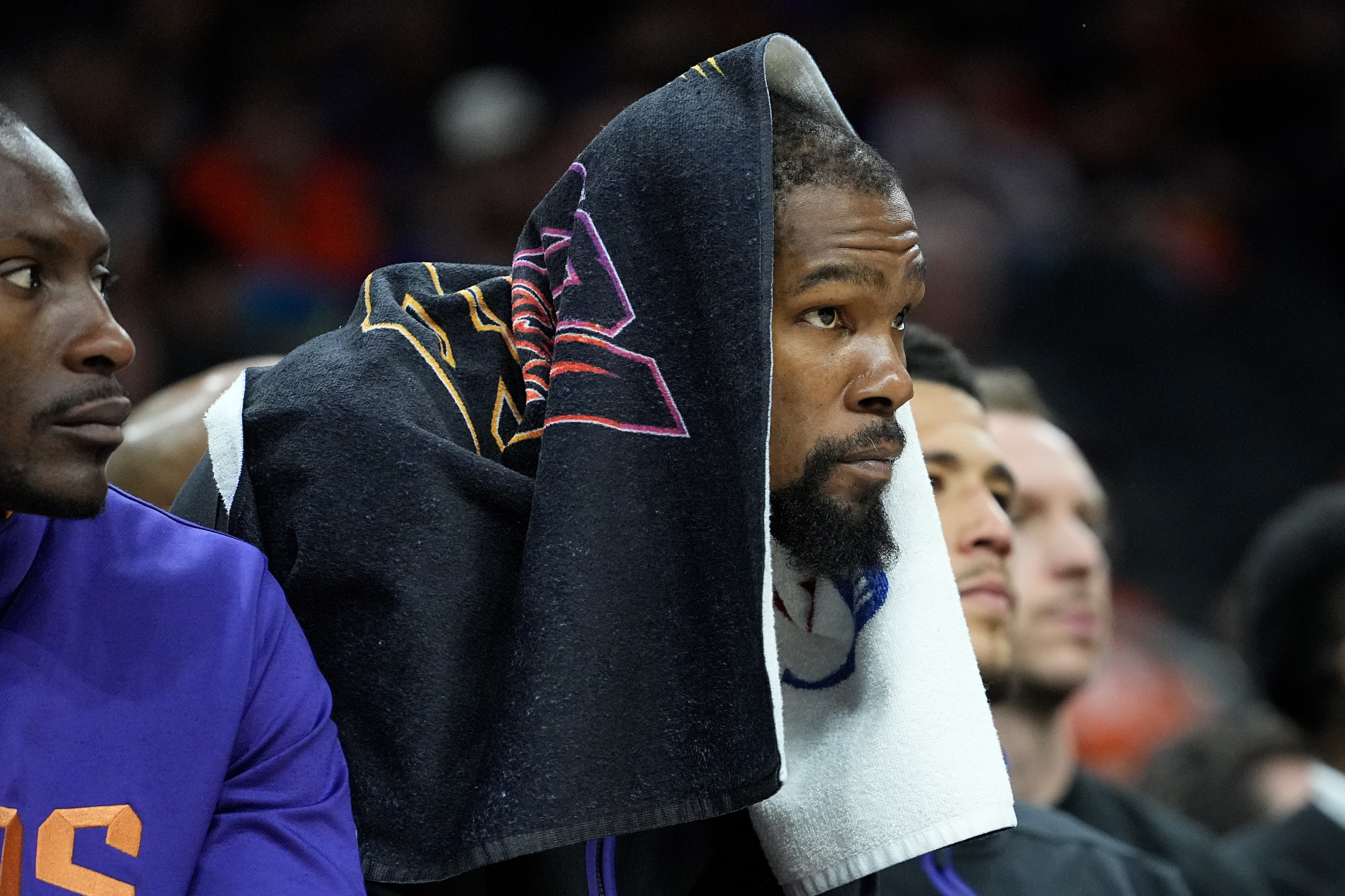 Phoenix Suns forward Kevin Durant watches from the bench during the second half of Game 6 of an NBA basketball Western Conference semifinal series against the Denver Nuggets, Thursday, May 11, 2023, in Phoenix. The Nuggets eliminated the Sun in their 125-100 win. 