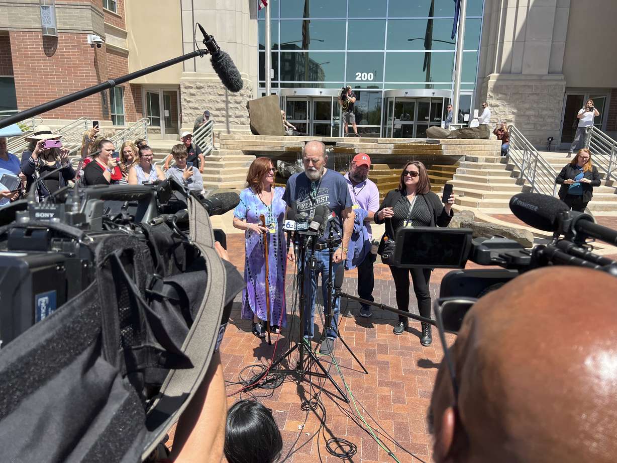Larry and Kay Woodcock, the grandparents of slain 7-year-old Joshua "JJ" Vallow, speak outside court after JJ's mother, Lori Vallow Daybell, was convicted of murder in the deaths of her two youngest children and conspiracy to commit murder in the death of a romantic rival, on Friday, in Boise, Idaho. Daybell was convicted of those and other charges after a weekslong trial that focused on her involvement in a bizarre, doomsday-like plot.