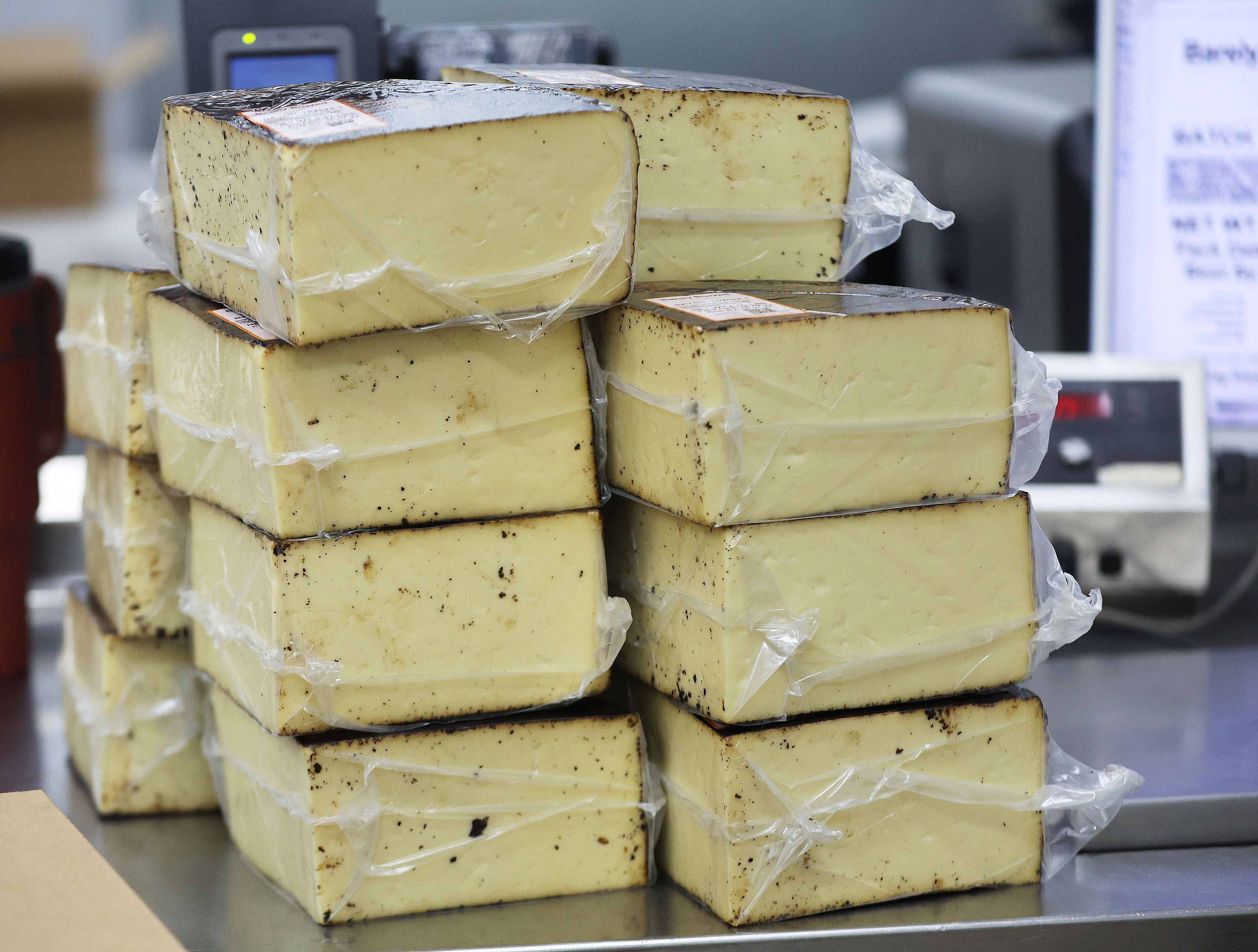 Cheese is packaged at Beehive Cheese, a second generation family-owned business, in Uintah, Weber County, May 2.