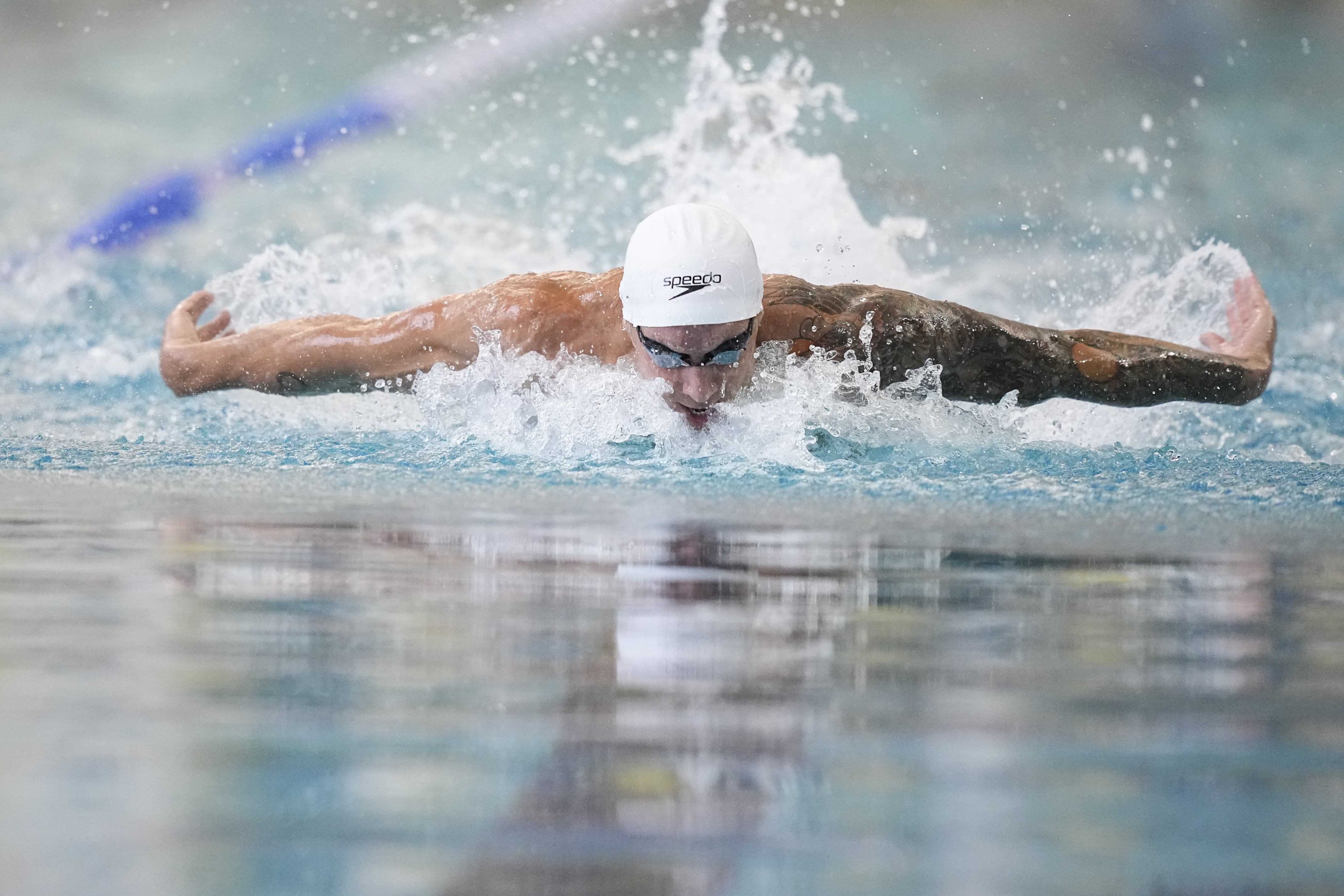 Caeleb Dressel swims the men's 100 butterfly during the Speedo Atlanta Classic finals Friday, May 12, 2023, in Atlanta.