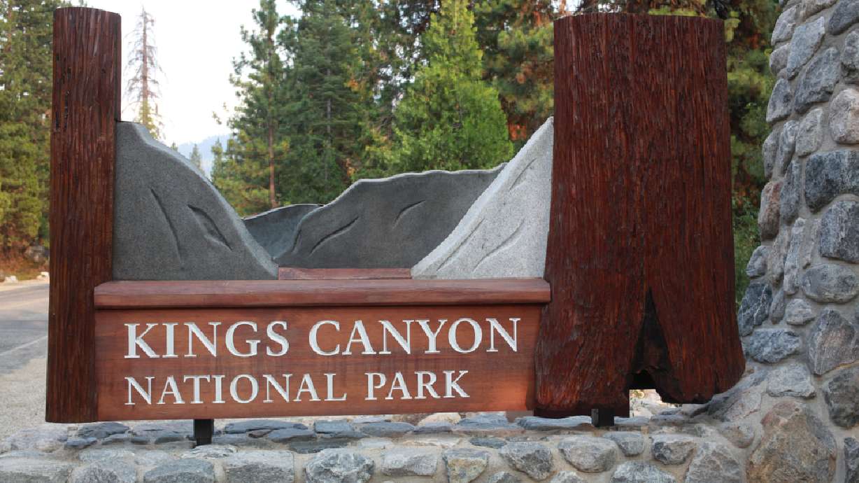 The sign entering Kings Canyon National Park from Sequoia National Park. A new report examines when legendary photographer Ansel Adams took a photo at Kings Canyon National Park by using the position of the moon in the photo.