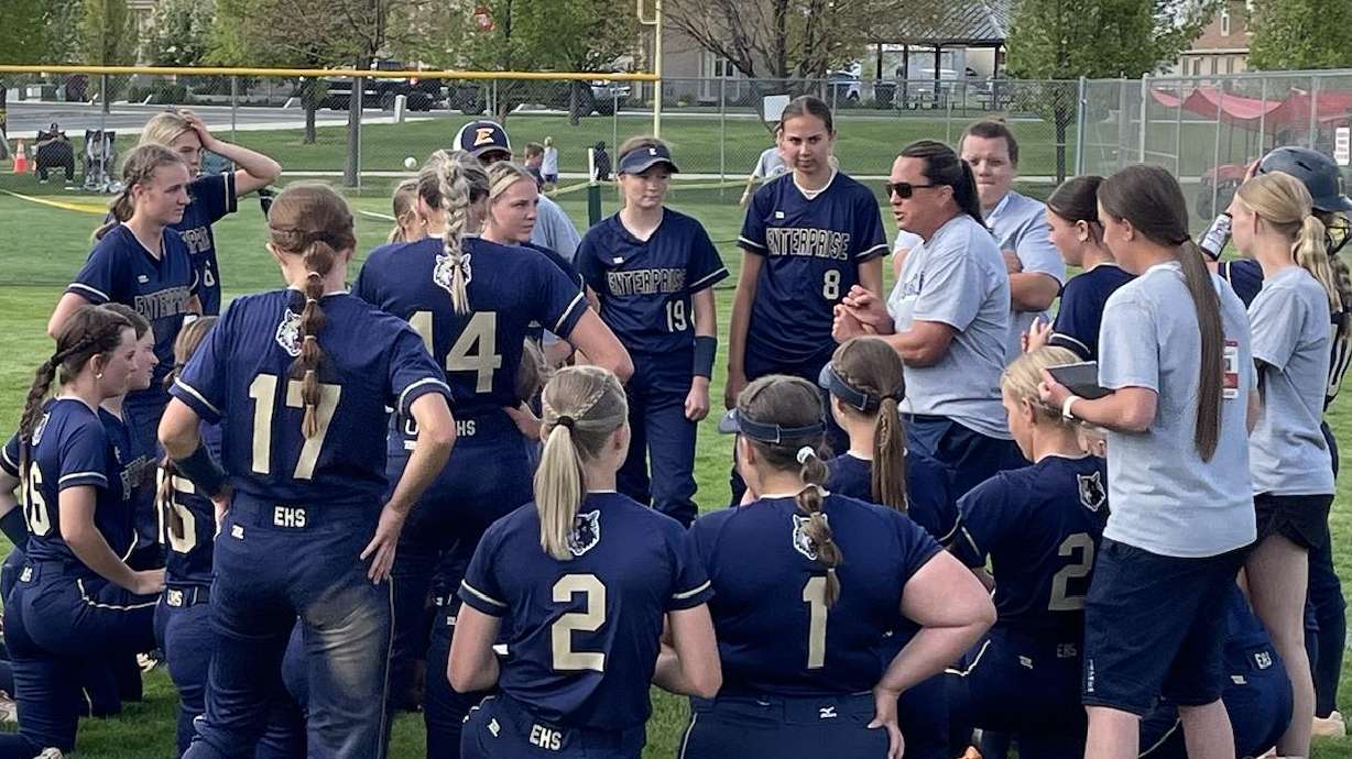 Enterprise players listen to their coaching staff on May 12, 2023, at the Spanish Fork Softball Complex.