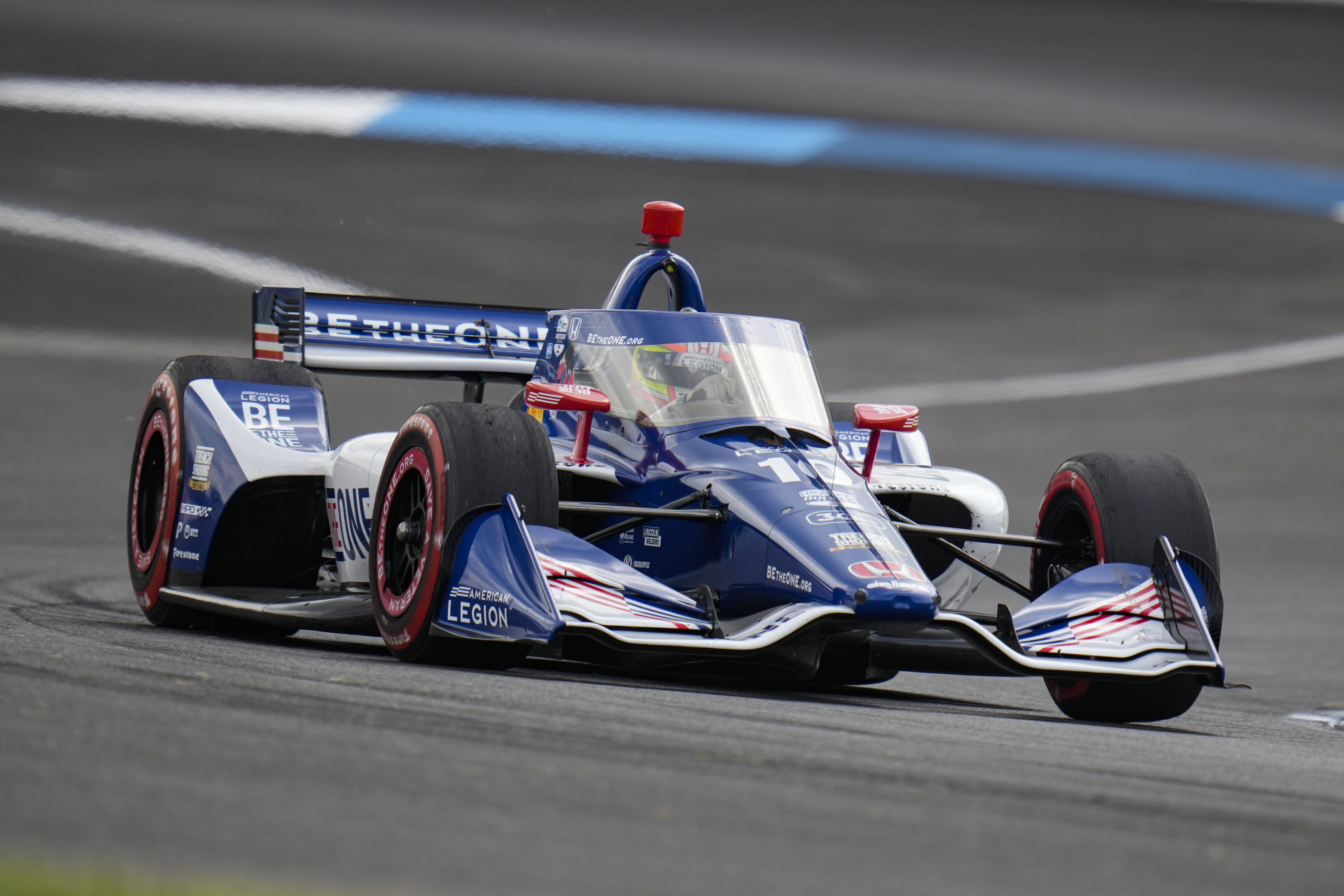 Alex Palou, of Spain, drives through a turn during the IndyCar auto race at Indianapolis Motor Speedway in Indianapolis, Saturday, May 13, 2023. 