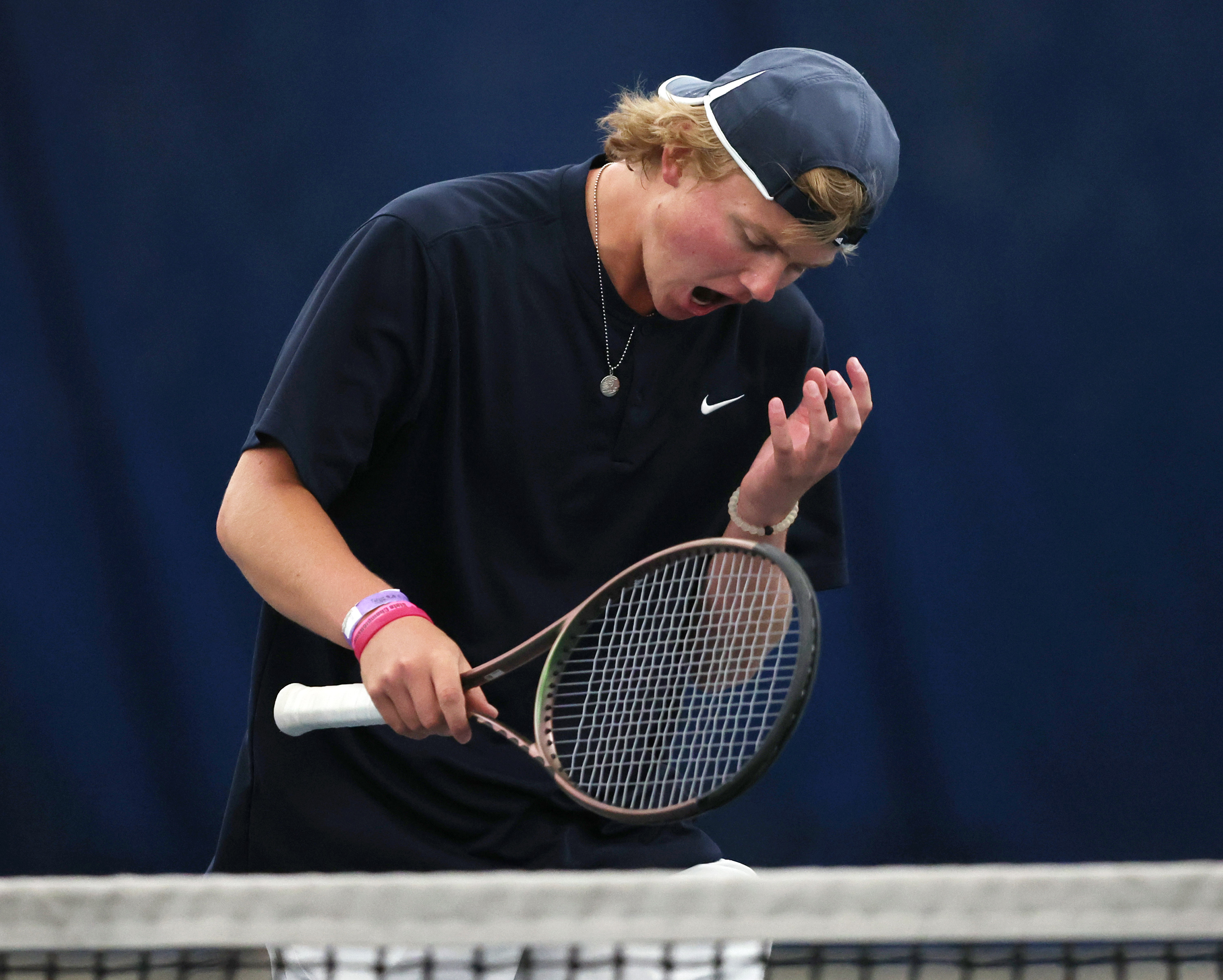 Brighton's Ford Owen celebrates a point against Alta's Griffin Schroeder in the 5A high school tennis championships at Salt Lake Tennis on Saturday, May 13, 2023.
