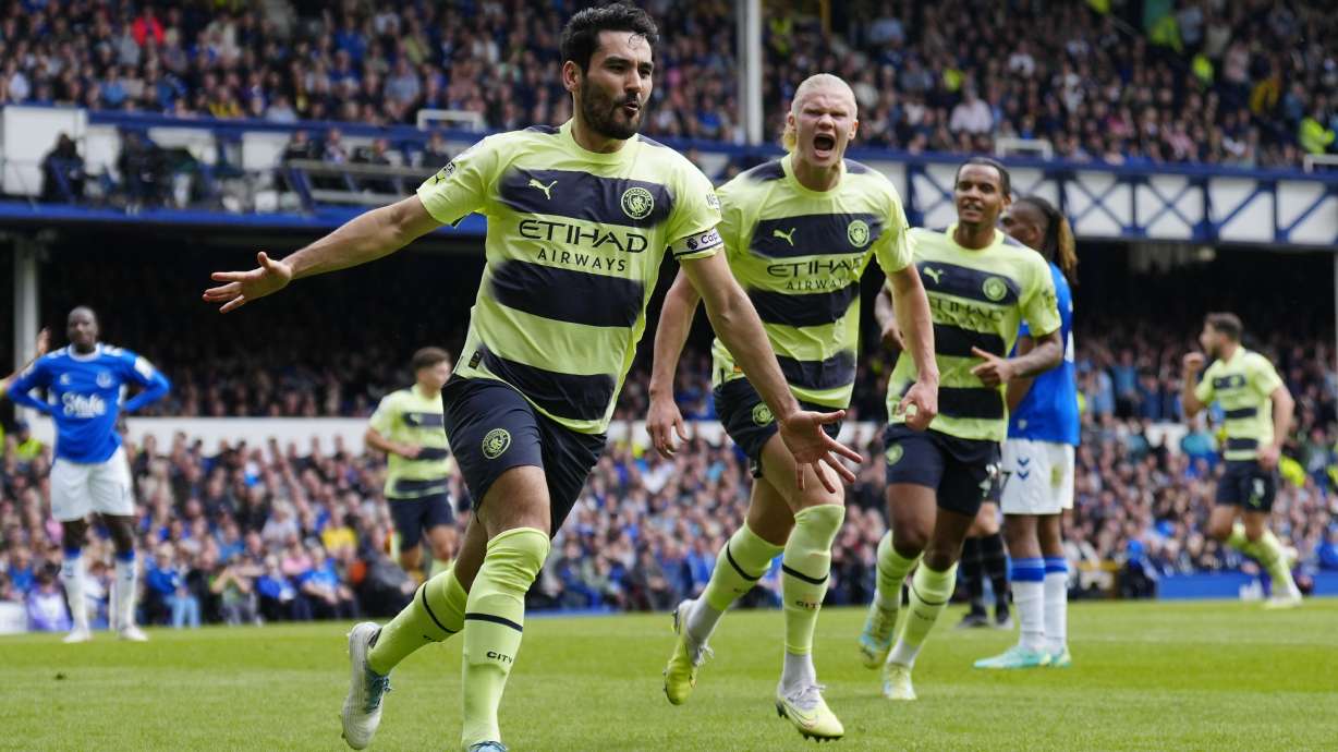 Manchester City's Ilkay Gundogan celebrates after scoring his side's opening goal during the English Premier League soccer match between Everton and Manchester City at the Goodison Park stadium in Liverpool, England, Sunday, May 14, 2023.