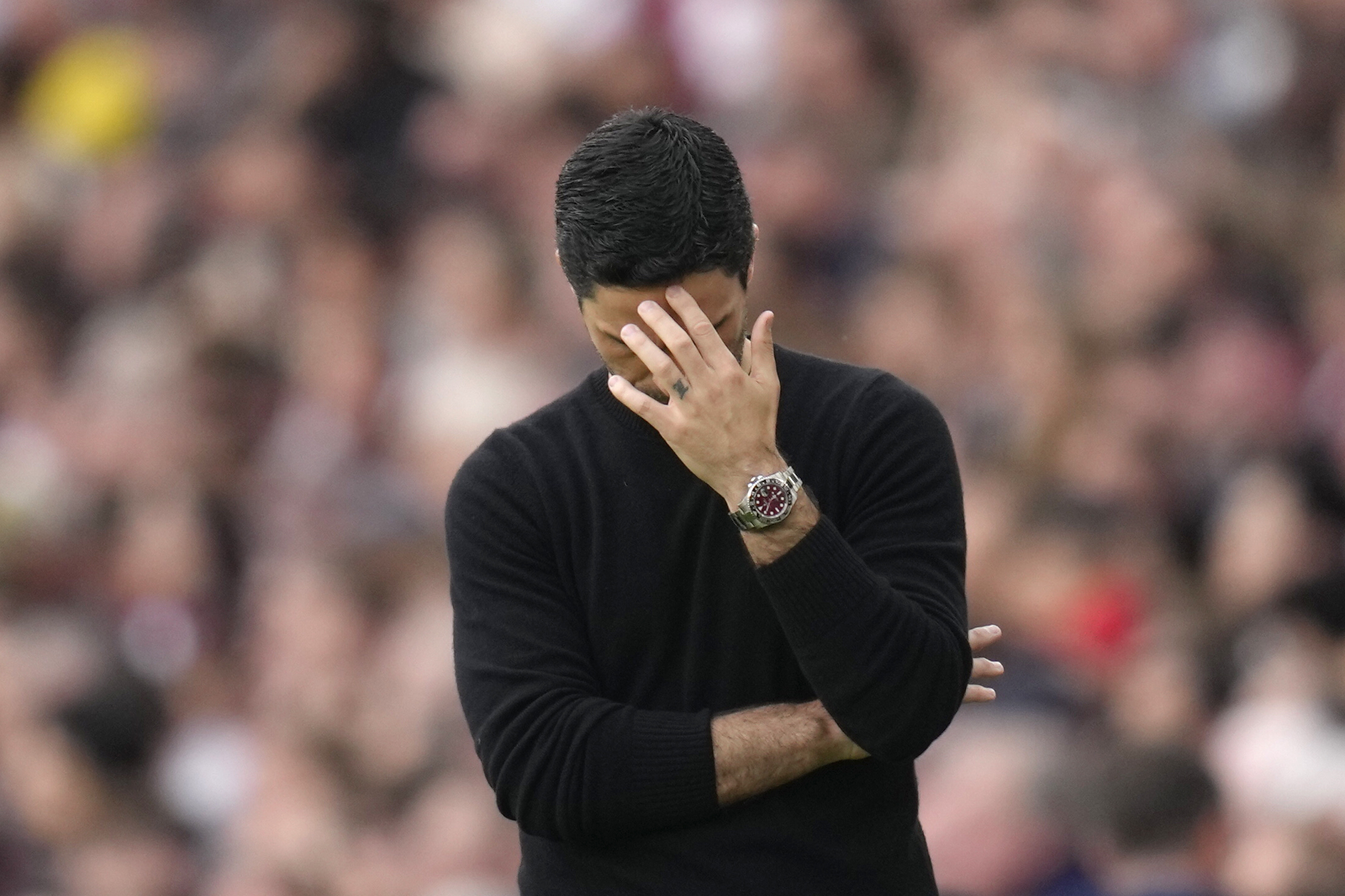 Arsenal's manager Mikel Arteta reacts after Brighton's Julio Enciso scored his side's opening goal during the English Premier League soccer match between Arsenal and Brighton and Hove Albion at Emirates stadium in London, Sunday, May 14, 2023. 