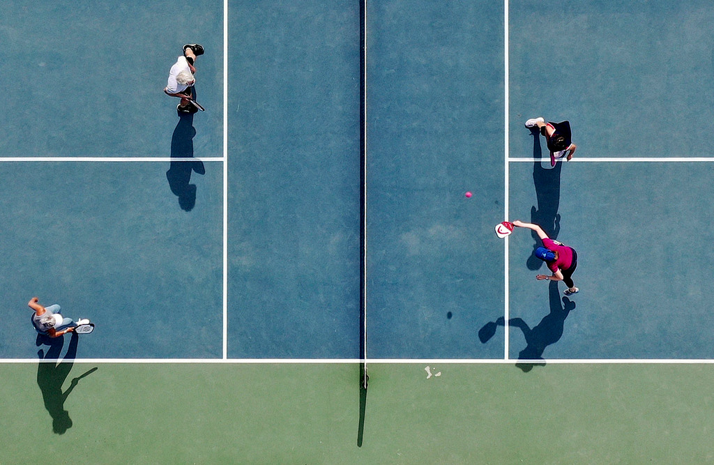 People play pickleball at 11th Avenue Park in Salt Lake City on Friday.