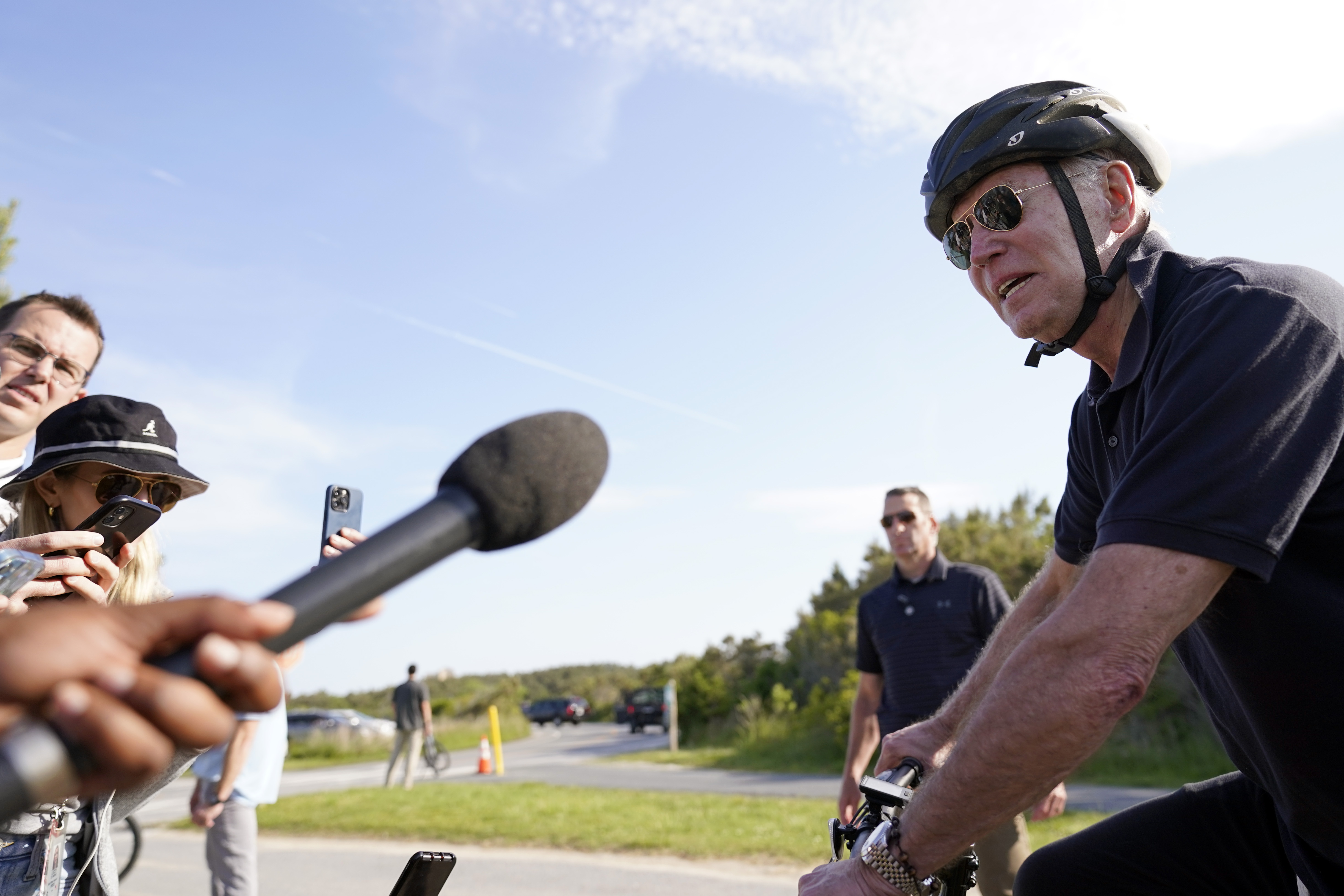 President Joe Biden speaks to the media in Gordons Pond State Park in Rehoboth Beach, Del., Sunday. Biden says he and congressional leaders will likely resume talks on Tuesday at the White House over the debt limit.