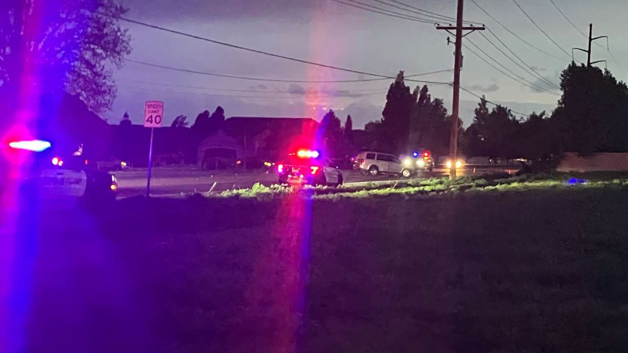 One woman was killed in a head-on collision involving two cars in Layton on Sunday.