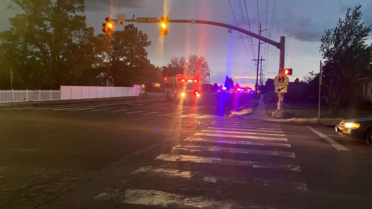 Emergency responders in Layton on May 14, 2023, after one person was killed and five others were injured in an accident. A Syracuse woman has pleaded guilty to felony charges.