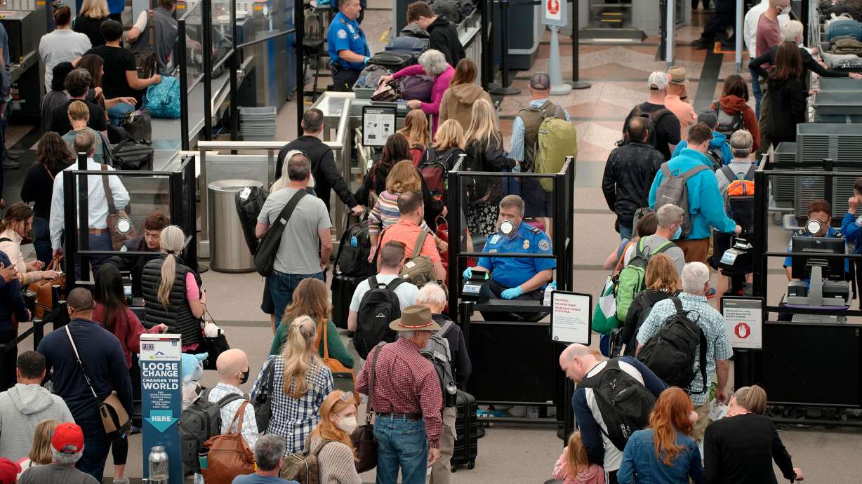 Pictured are travelers at Denver International Airport in 2022. AAA says this Memorial Day weekend could be the busiest at airports since 2005.