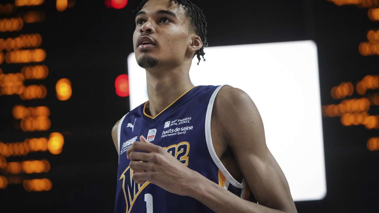Boulogne-Levallois' Victor Wembanyama looks on during the Elite basketball match Boulogne-Levallois against JDA Dijon at the Palais de Sports Jean-Michel Geoffroy in Dijon, central France, Sunday, Jan. 15, 2023. On Sunday, May 7, 2023, he played before a crowd of about 15,000 fans in Paris as part of his farewell tour before coming to the NBA. Wembanyama is about a week away from learning which team will be picking him in the NBA Draft.