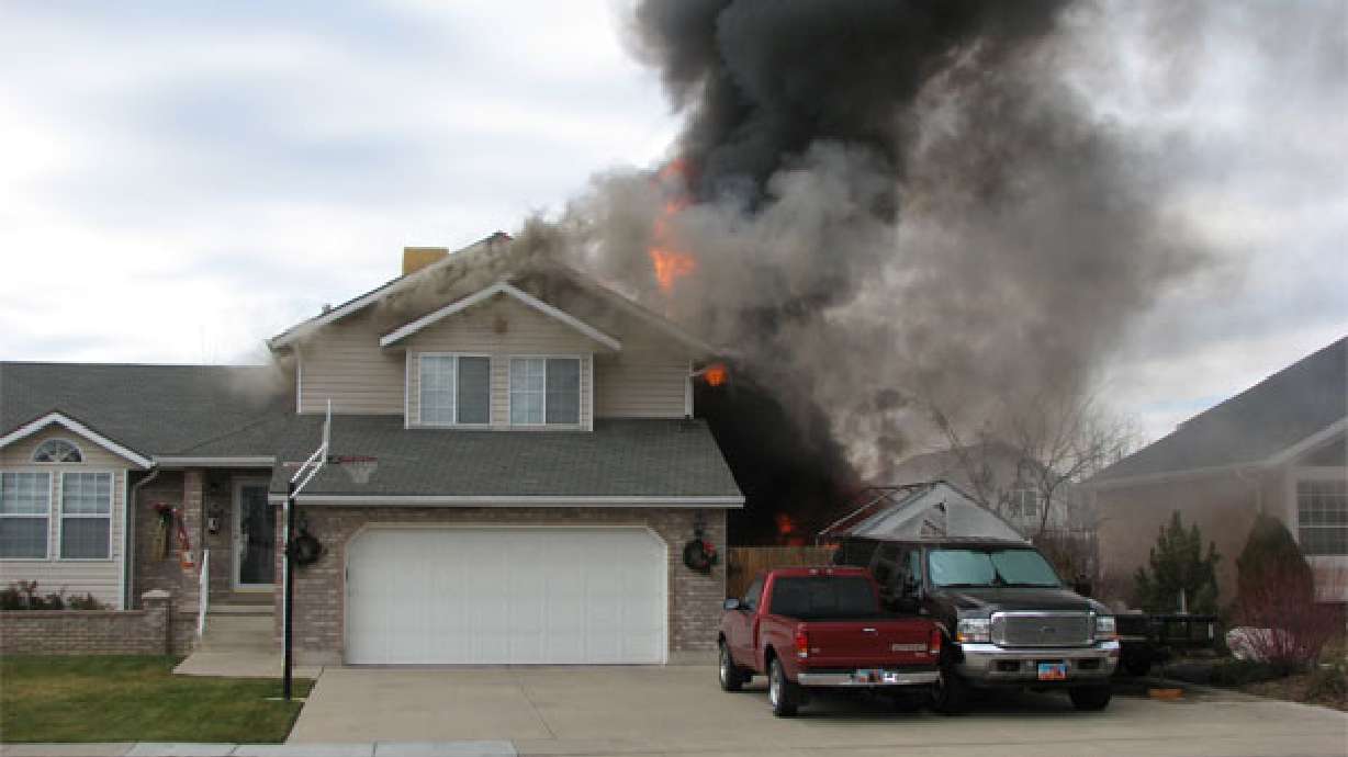 Three Burned in Roy House Fire