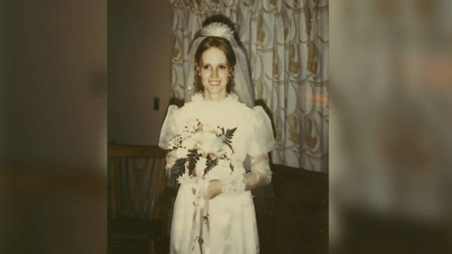 Nancy Perry poses in her wedding dress circa April 1970.