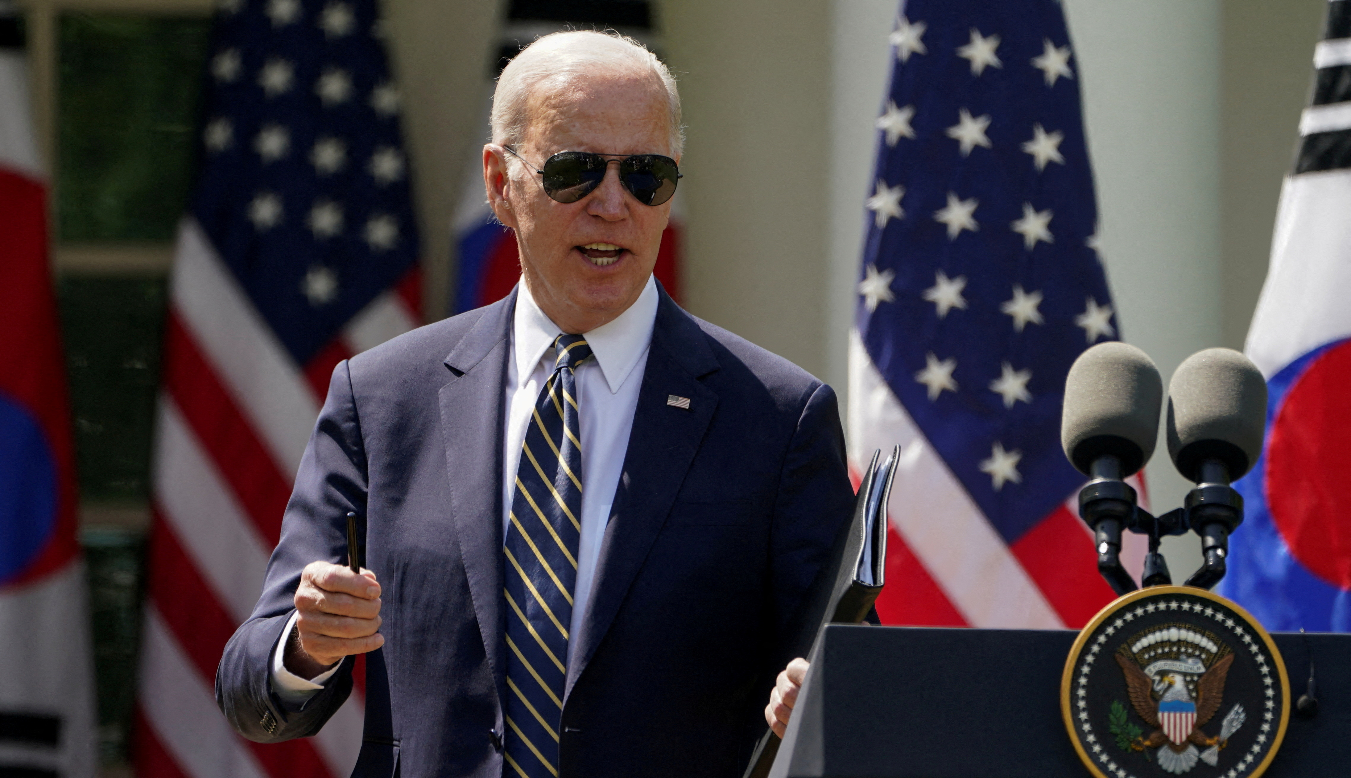 President Joe Biden answers a question about the debt limit at the White House in Washington, April 26. Biden continues to hold an edge over potential Republican challengers Donald Trump and Ron DeSantis, a poll finds.
