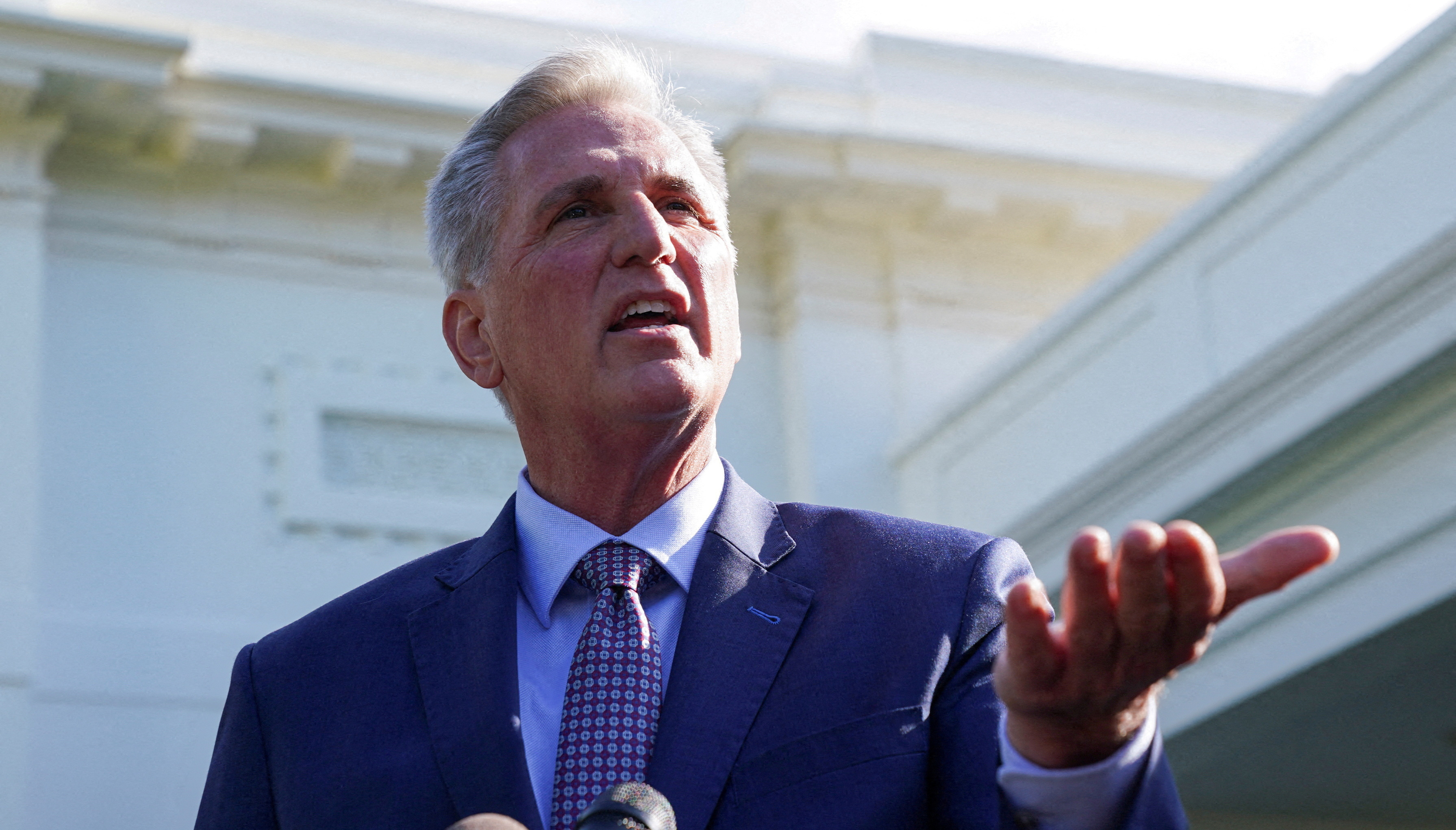 House Speaker Kevin McCarthy speaks to reporters following debt limit talks with President Joe Biden at the White House in Washington May 9. Americans are worried about the prospect of the U.S. government defaulting if Congress fails to raise the debt ceiling, a poll finds.