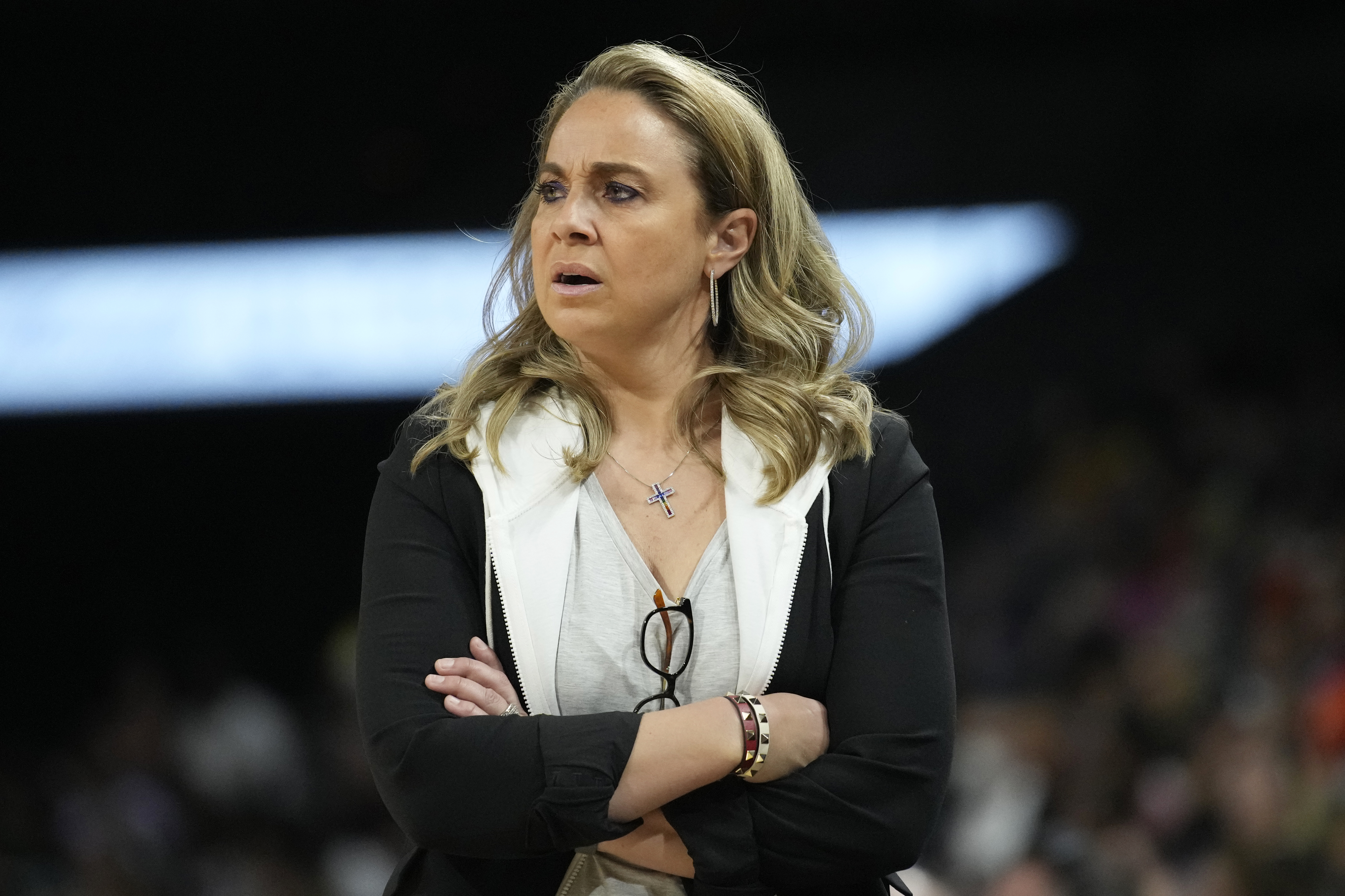 FILE - Las Vegas Aces head coach Becky Hammon looks on during a WNBA game against the Dallas Wings Sunday, June 5, 2022, in Las Vegas. The WNBA suspended Las Vegas Aces coach Becky Hammon for two games without pay Tuesday, May 16, 2023, for violating league and team respect in the workplace policies. The violation was related to comments made by Hammon to Dearica Hamby in connection with the player's recent pregnancy. 