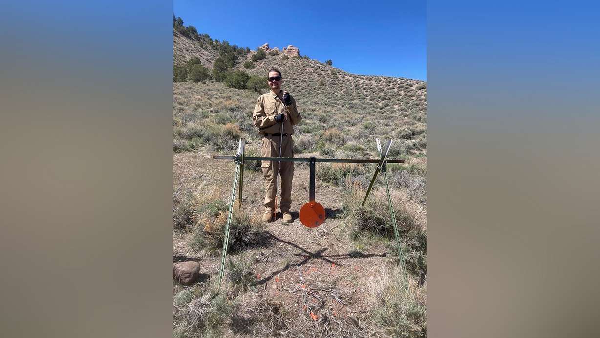 Shaun Payne is seen at a shooting range on his friend Stephen Miller's farm on April 29. The two men, who are both blind, enjoy shooting together.