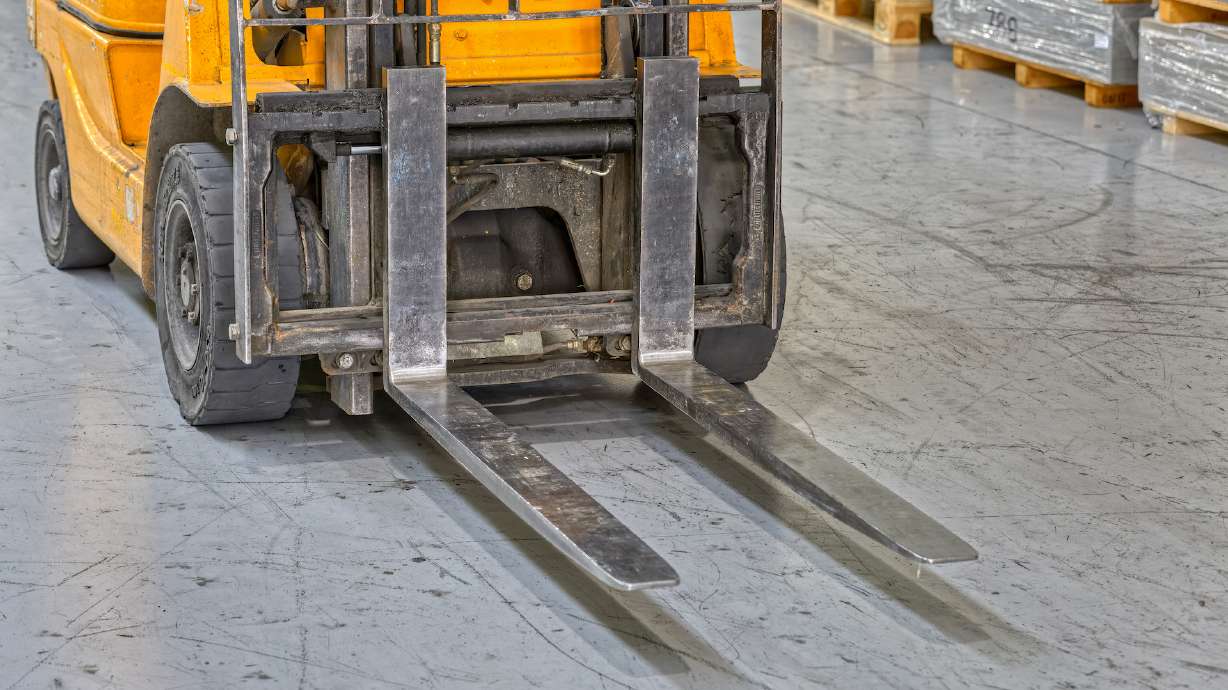 A Davis County man was killed Monday after being pinned by a forklift at work, according to police.