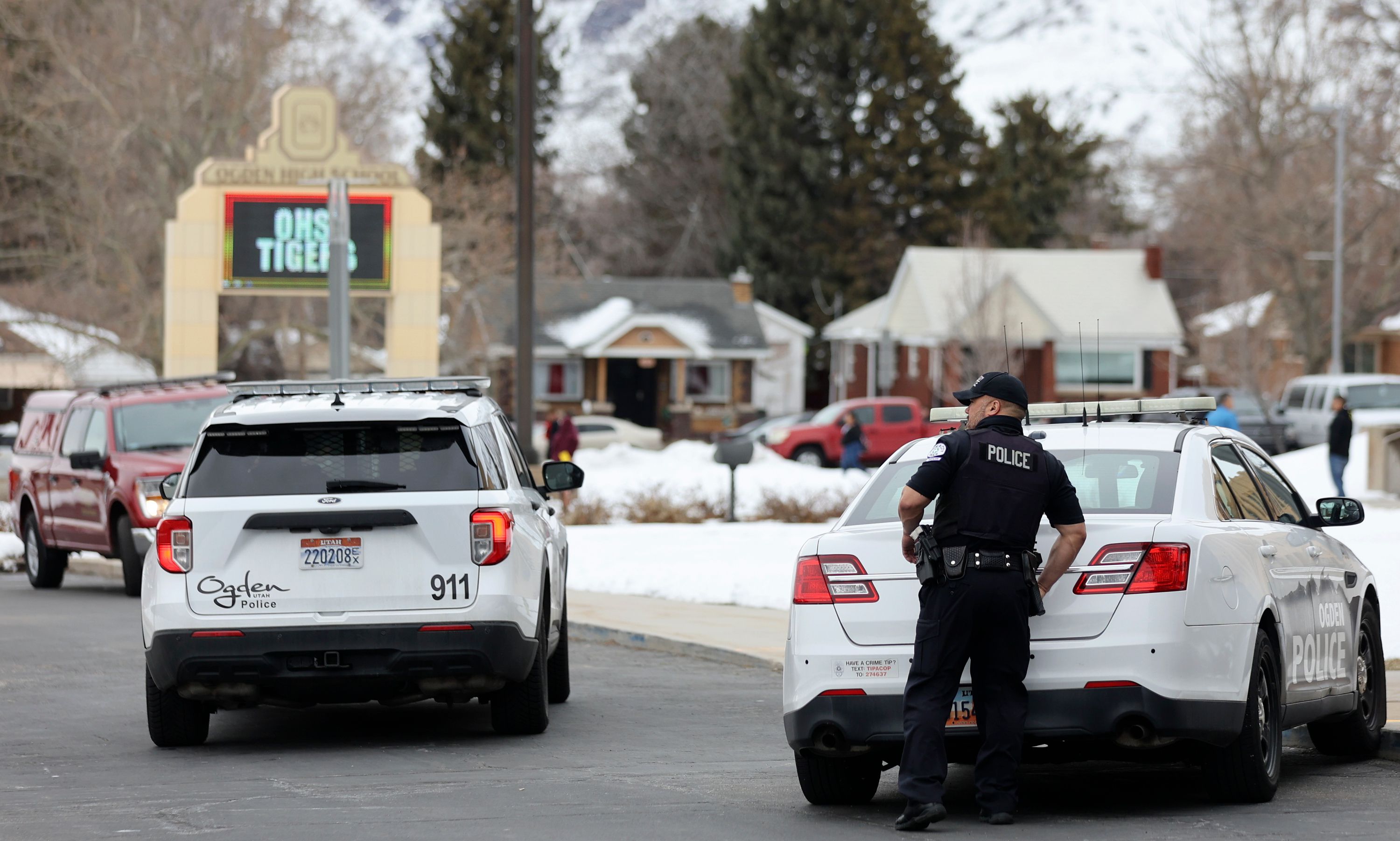 Police maintain a presence after responding to false threats of shots fired at Ogden High School in Ogden on March 29. Police agencies along the Wasatch Front and northern Utah responded to similar reports of school violence on Wednesday morning.