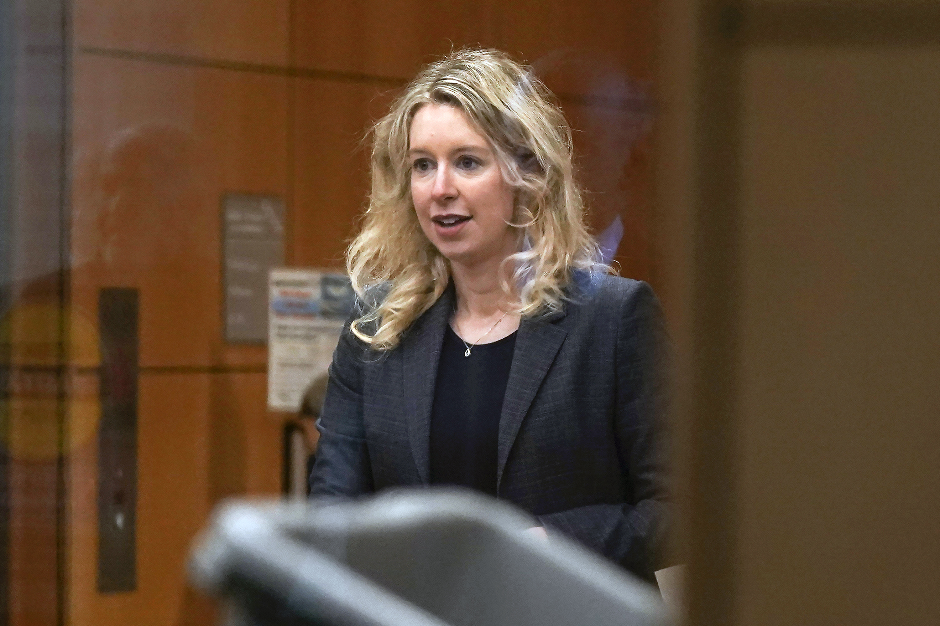 Former Theranos CEO Elizabeth Holmes arrives at federal court in San Jose, Calif., Oct. 17, 2022. Holmes has once again lost her bid to stay out of prison while she appeals her fraud conviction tied to a blood-testing hoax that bilked investors.