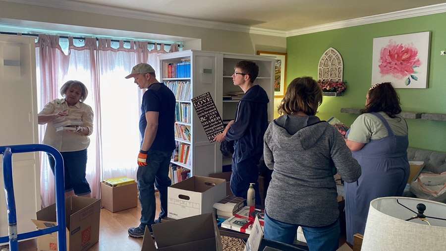 Neighbors gathered at the home of the Boyle family to renovate their home as a surprise for the family that is struggling with terminal illness.