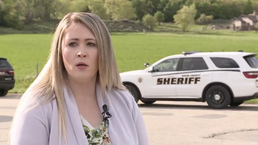 Stephanie Dinsmore, spokeswoman for the Davis County Sheriff's Office, speaks to news media about the situation involving a barricaded man firing shots in South Weber on Wednesday morning.