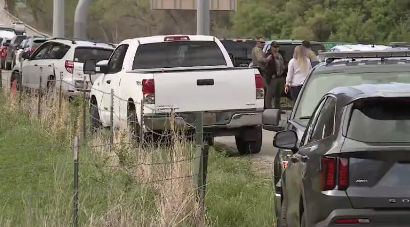 About 50 officers from various police agencies responded to a barricaded man firing shots in South Weber on Wednesday morning.