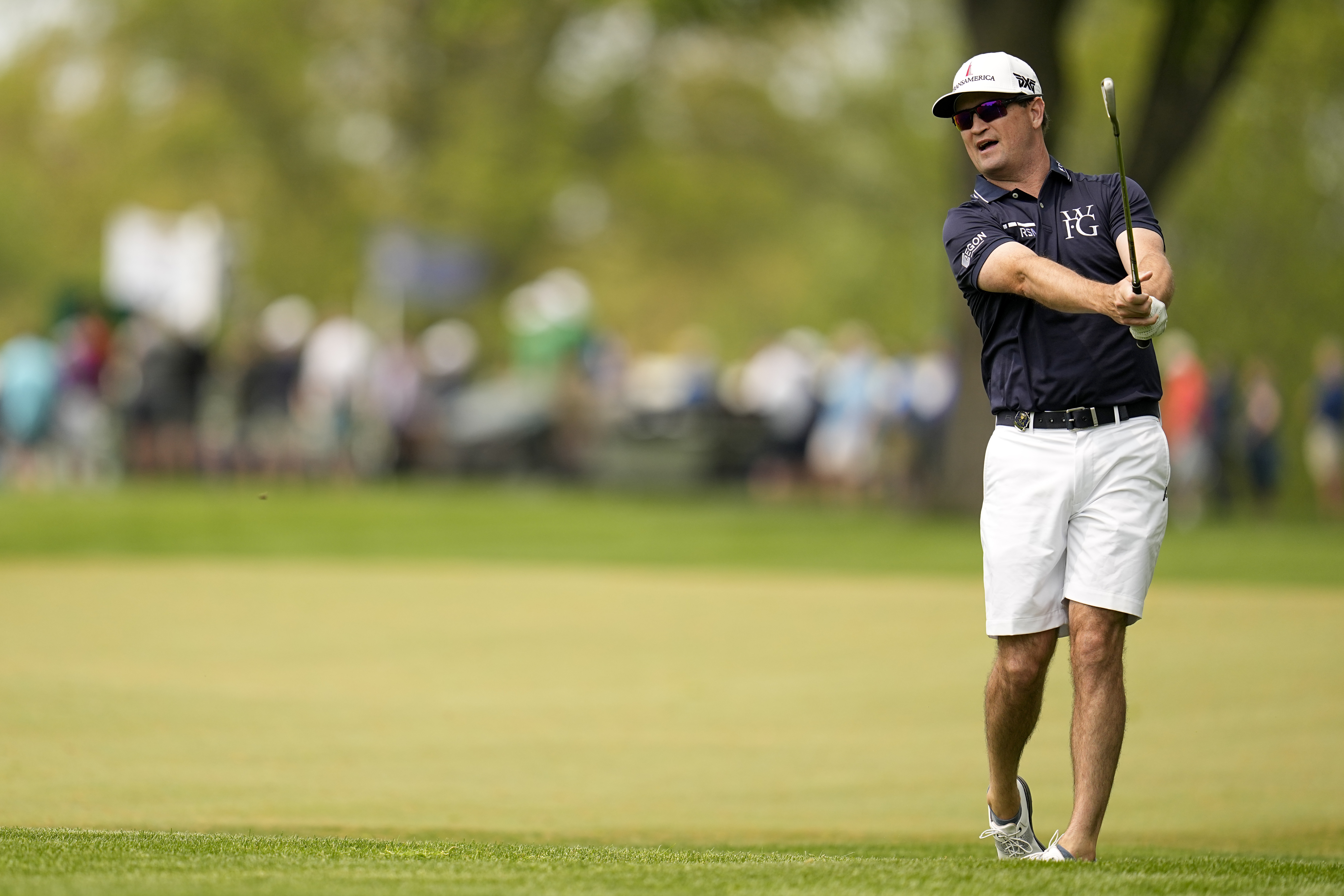 Zach Johnson hits from the rough on the 16th hole during a practice around for the PGA Championship golf tournament at Oak Hill Country Club on Tuesday, May 16, 2023, in Rochester, N.Y. 