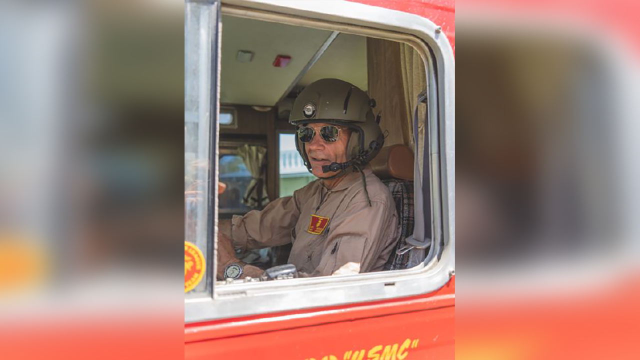 Retired U.S. Marine Capt. Scott Montefusco, of Sandy, plans to retrace the first cross-country vehicle trek in his 1953 Willys Jeep to raise money for veterans. He will don a bluetooth helmet in the topless vintage vehicle from San Francisco to New York.