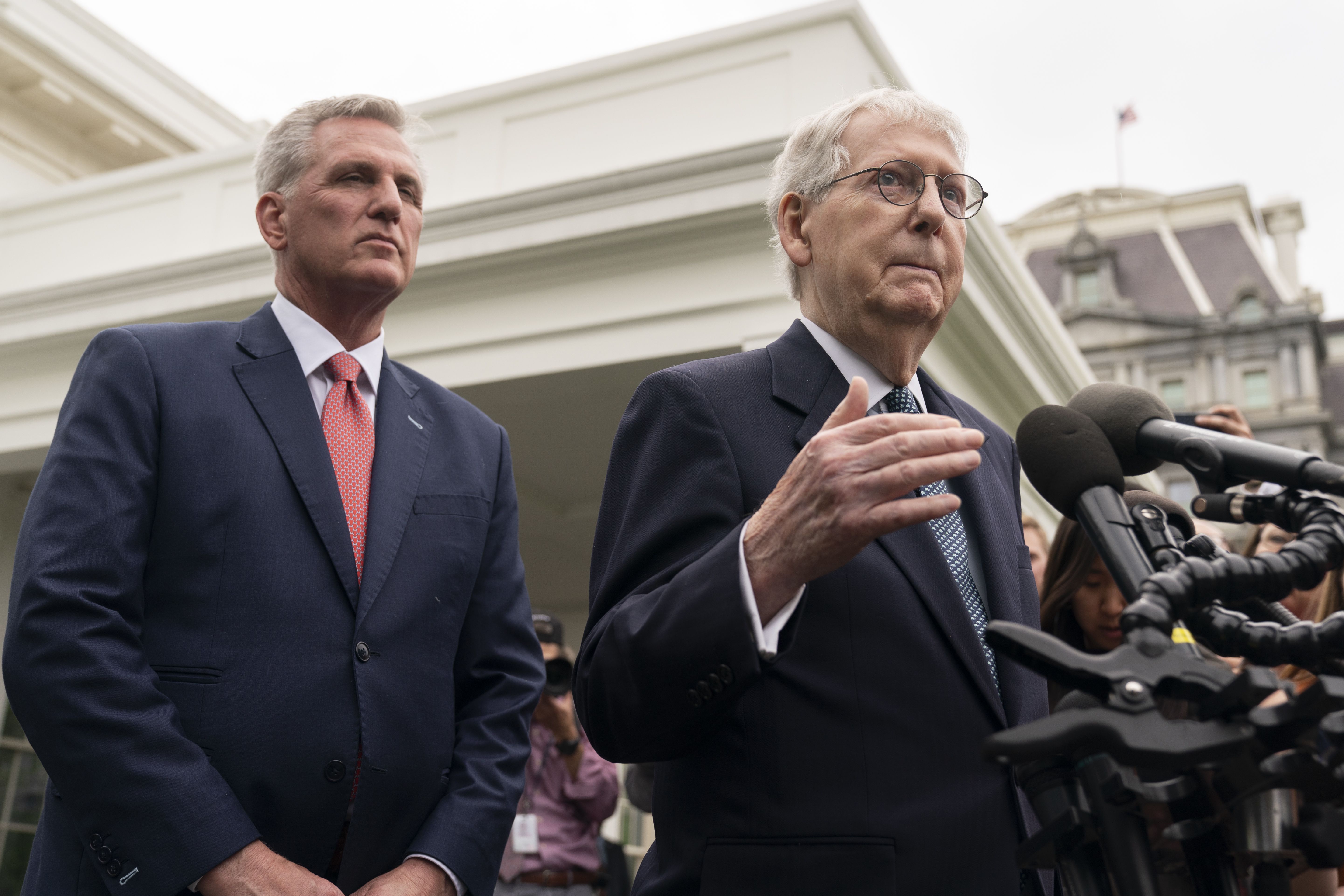 Senate Minority Leader Mitch McConnell of Kentucky and House Speaker Kevin McCarthy of California talk to reporters after meeting with President Joe Biden, and others in the Oval Office of the White House, Tuesday.