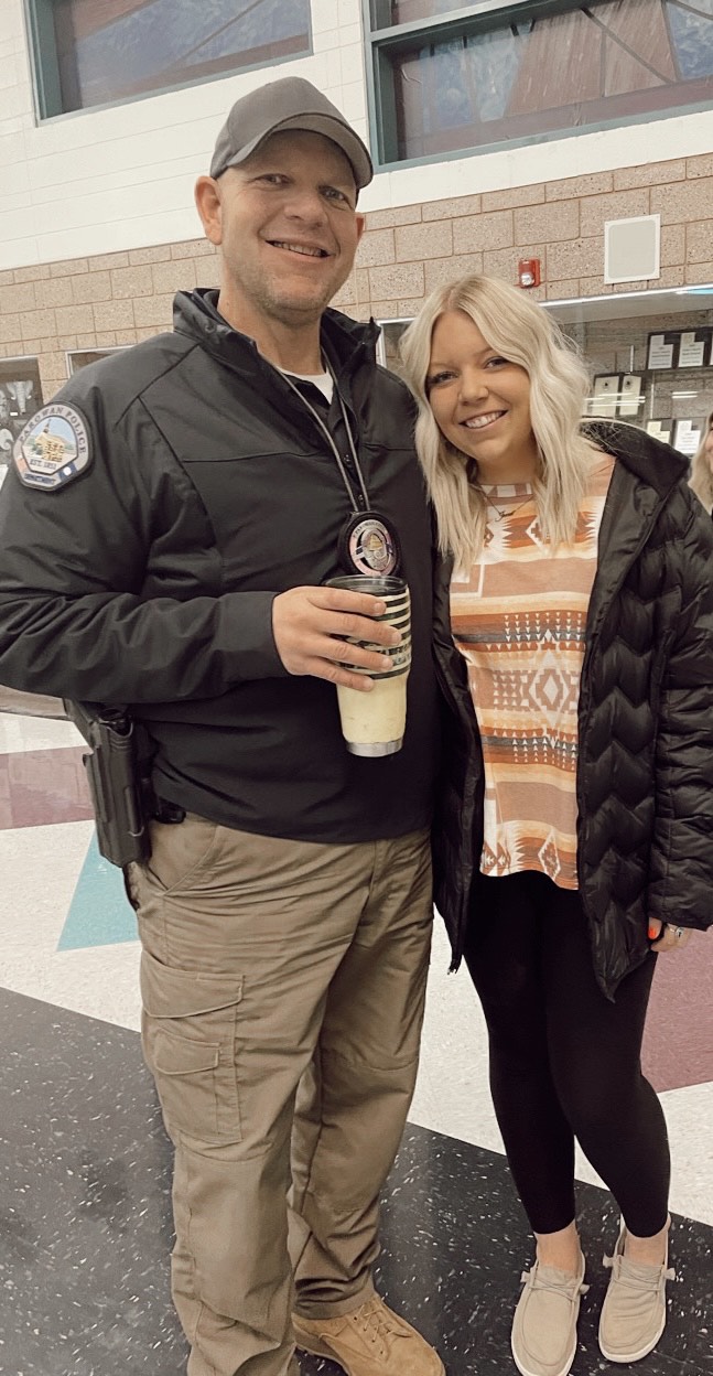 Mike Berg poses with his oldest daughter, 22-year-old Madison Berg Nunley, who is on track to become a therapist for first responders. She just finished her undergraduate degree in social work and family services, and hopes to pursue a master’s degree to obtain her licensed clinical social worker licensure. She believes her experience growing up in the home of a first responder will give her the ability to relate with other first responders.