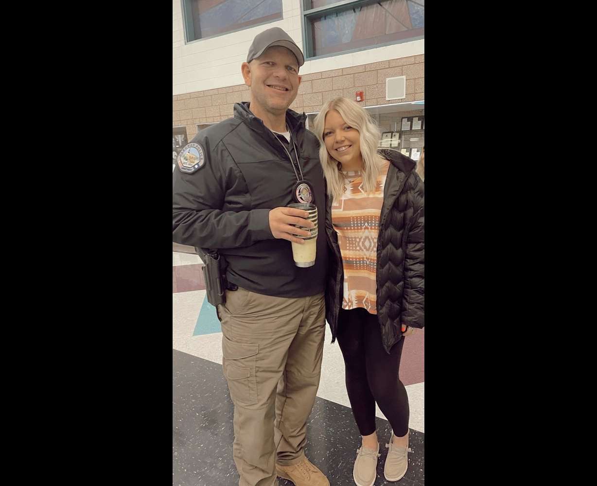Mike Berg poses with his oldest daughter, 22-year-old Madison Berg Nunley, who is on track to become a therapist for first responders. She just finished her undergraduate degree in social work and family services, and hopes to pursue a master’s degree to obtain her licensed clinical social worker licensure. She believes her experience growing up in the home of a first responder will give her the ability to relate with other first responders.
