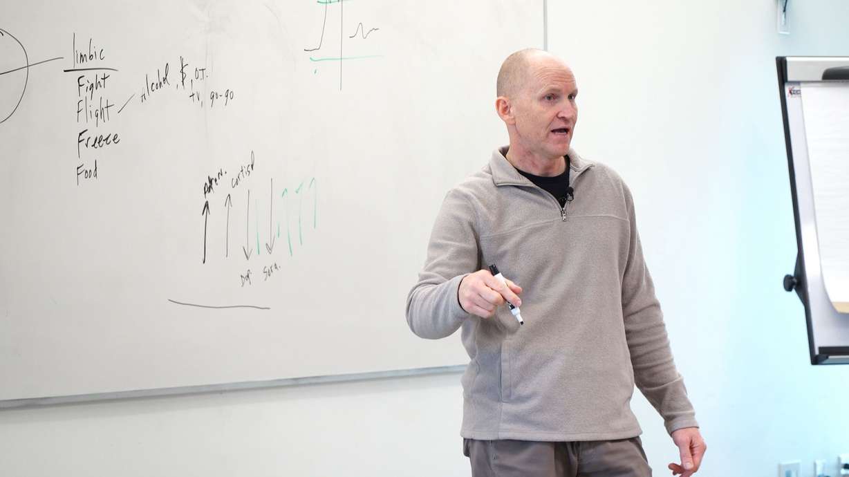Jeffrey Denning trains members of the Tooele County Dispatch on mental well-being. Denning conducts trainings on behalf of his organization, First Responders First, with agencies across Utah.