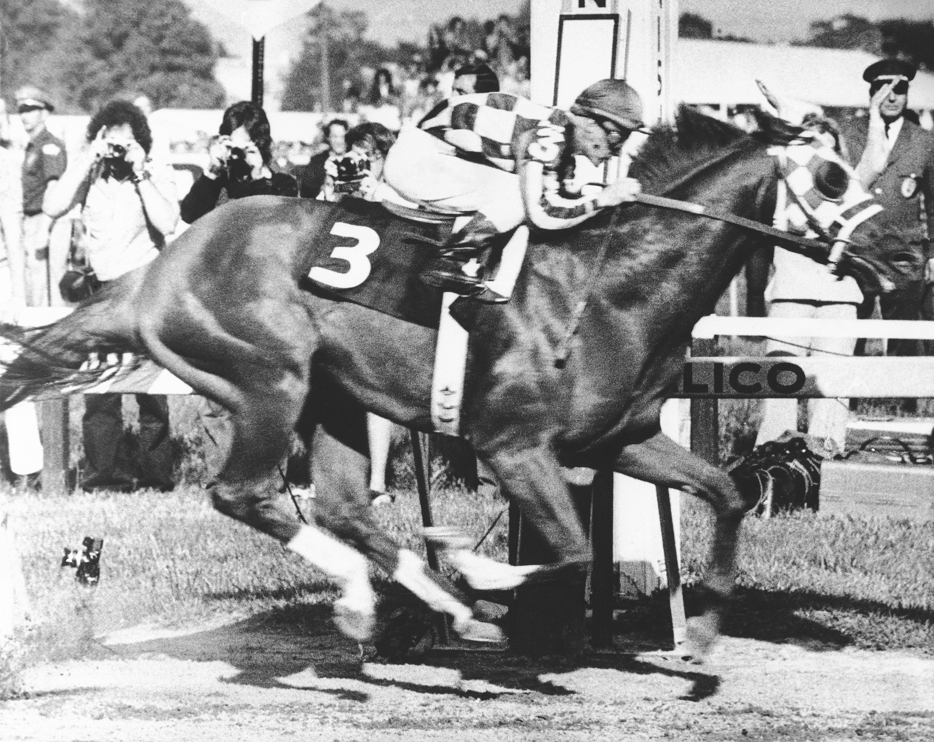 FILE - In this May 19, 1973 file photo, Secretariat, with Ron Turcotte up, wins the 98th Preakness Stakes horse race at Pimlico Race Course in Baltimore. Calling Secretariat a mere Triple Crown winner probably understates his dominance. The colt with the nickname Big Red not only won the Kentucky Derby, Preakness and Belmont Stakes in 1973 — he finished each in record time. 