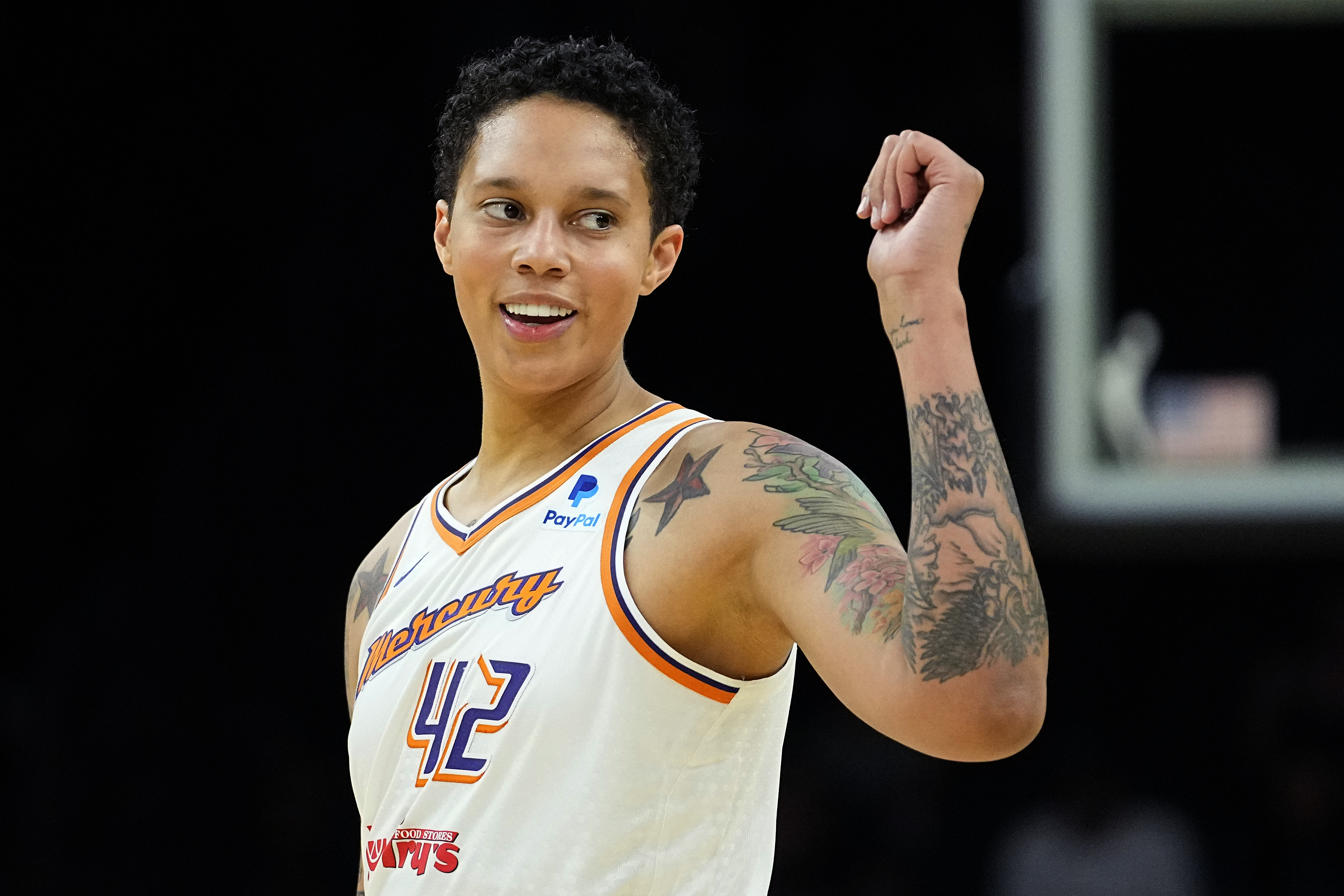 Phoenix Mercury center Brittney Griner smiles during the first half of a WNBA preseason basketball game against the Los Angeles Sparks, Friday, May 12, 2023, in Phoenix. 