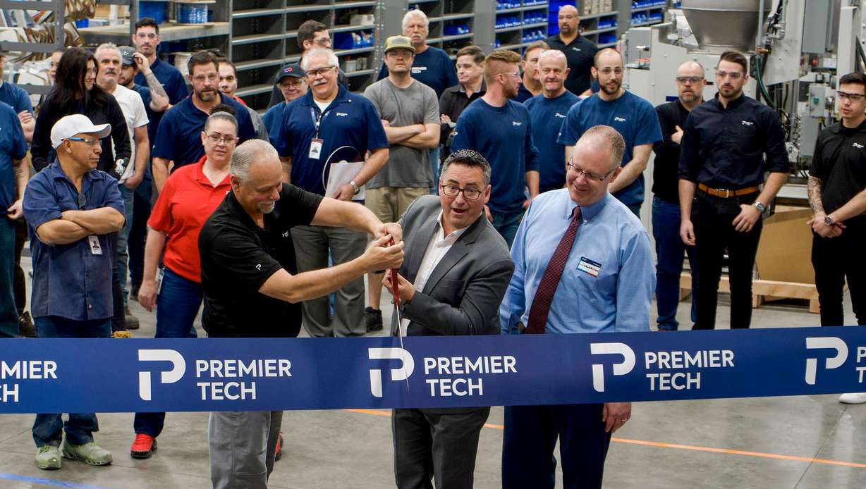 Woods Cross Mayor Ryan Westergard and Premier Tech leaders cut the ribbon to celebrate the opening of Premier Tech's new facility at 1894 W. 2425 South in Woods Cross on Wednesday.