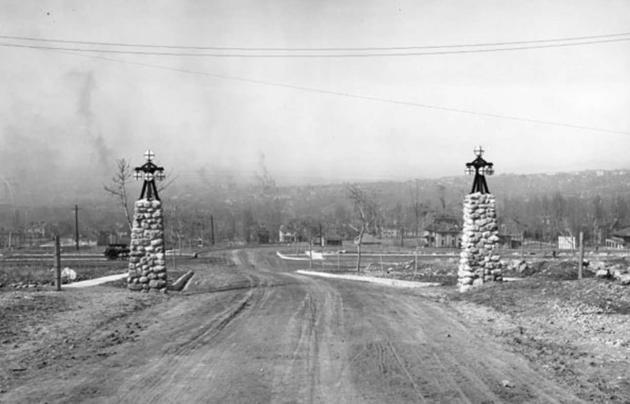 A photo of the view of the Federal Heights area and a stone pillar entrance way taken on March 2, 1909. The area was marketed as a refuge from smog in other parts of the valley.