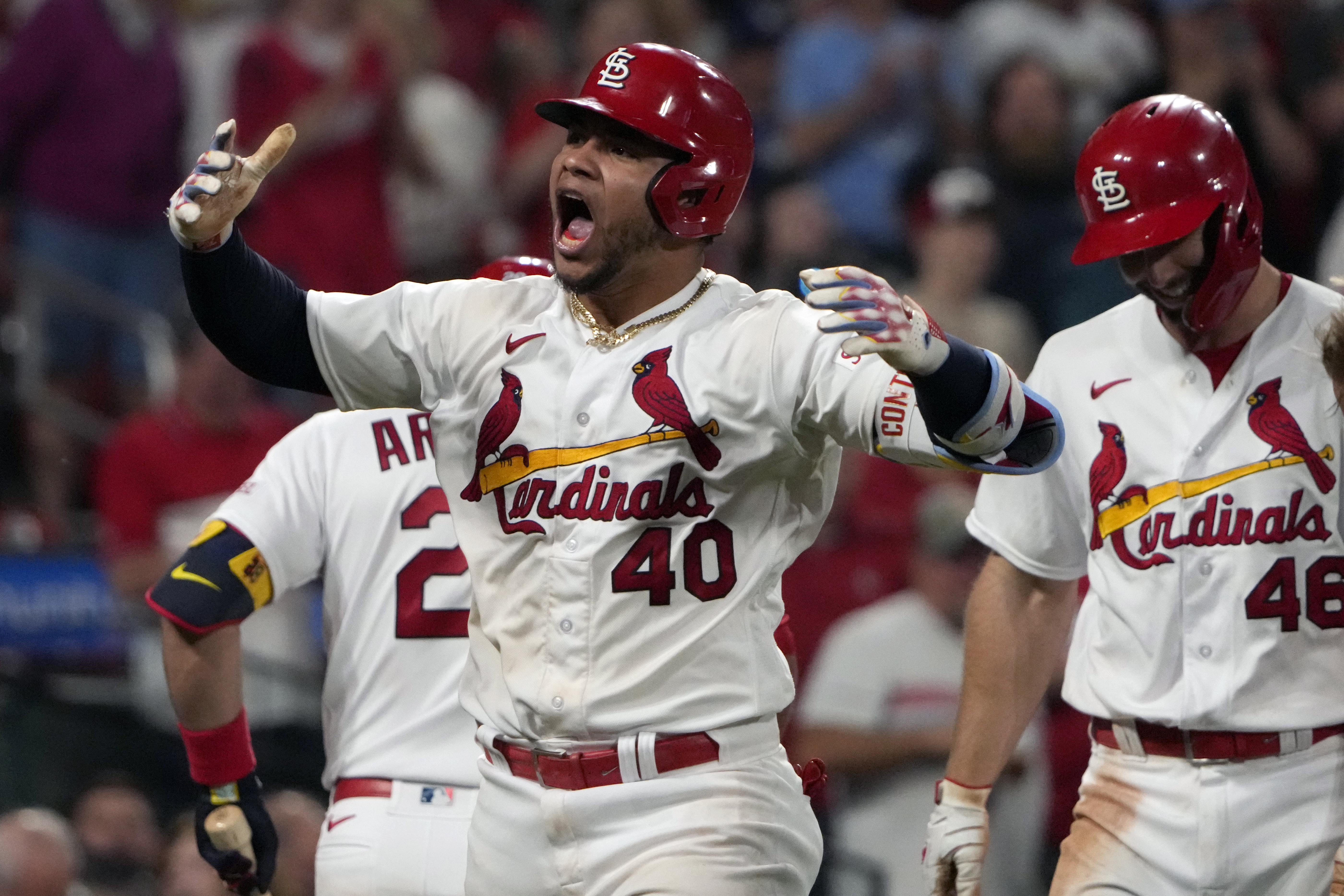 St. Louis Cardinals' Willson Contreras (40) celebrates after hitting a three-run home run during the eighth inning of a baseball game against the Los Angeles Dodgers Thursday, May 18, 2023, in St. Louis.