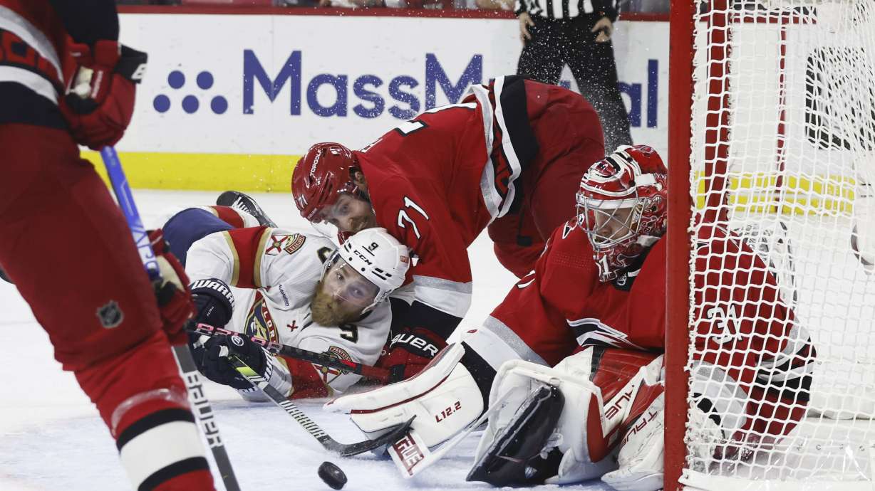 Florida Panthers' Sam Bennett (9) tries to shoot on Carolina Hurricanes goalie Frederik Andersen (31) during the second overtime in Game 1 of the NHL hockey Stanley Cup Eastern Conference finals, early Friday, May 19, 2023, in Raleigh, N.C.