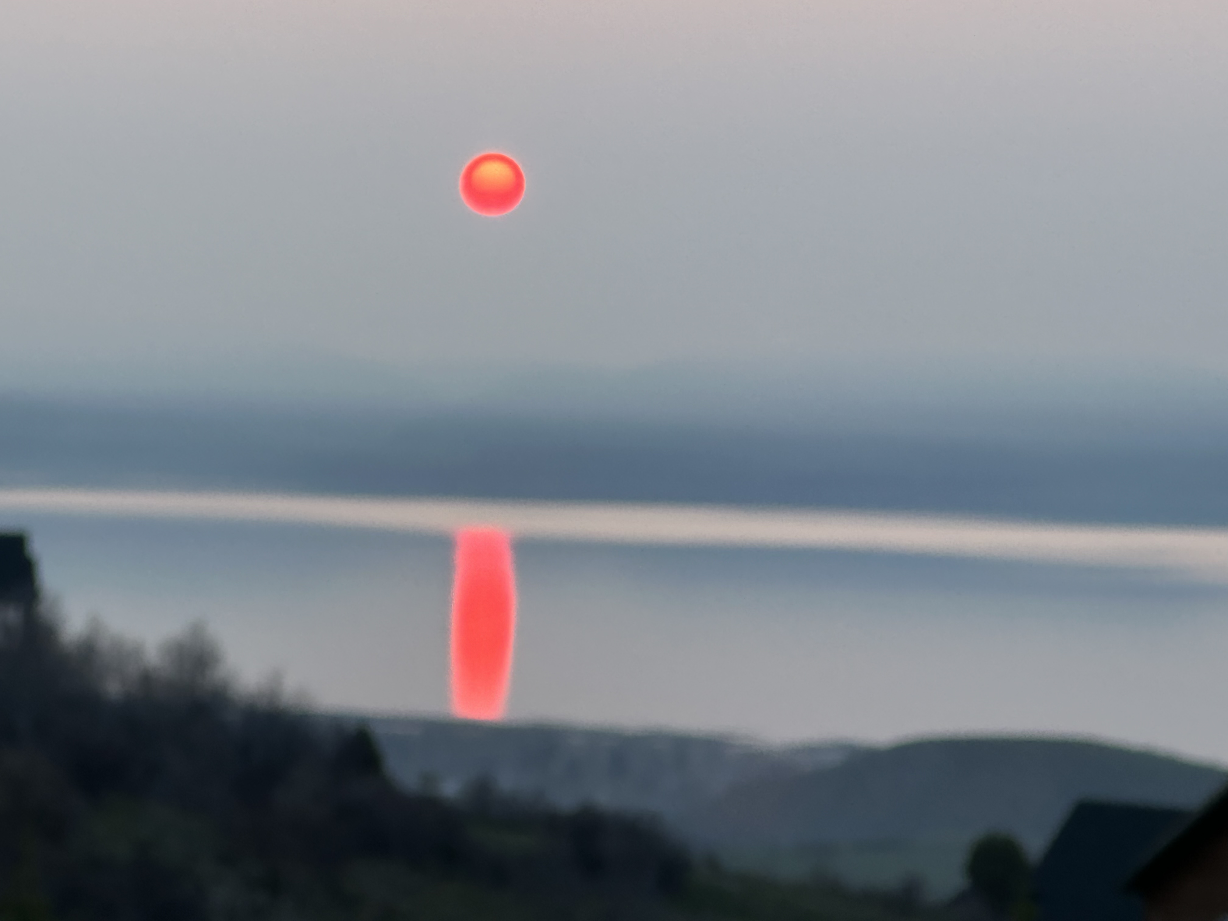 The sun rises through hazy skies over Bear Lake on Friday morning. Current weather patterns are sending wildfire smoke from Canada into Utah over the next few days, meteorologists say.