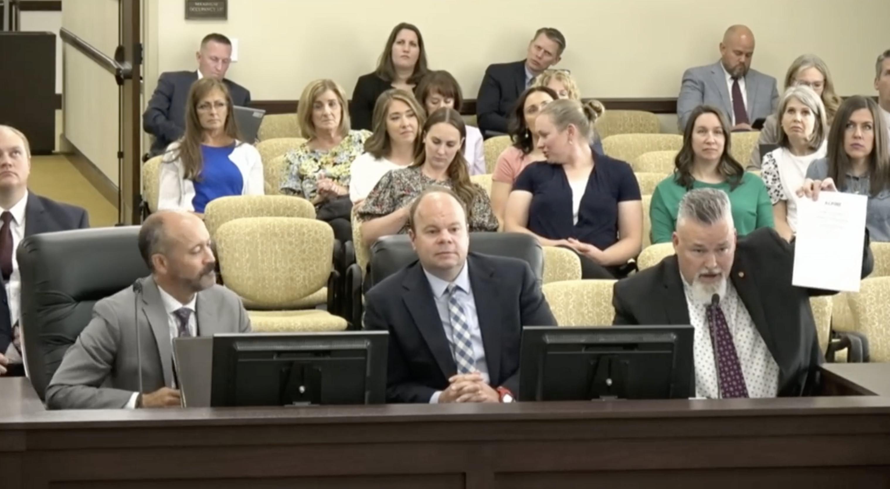 David Stephenson, Craig Brinkerhoff and Rob Smith, of Alpine School District, attend a legislative interim meeting on Thursday. Some lawmakers criticized the district's process of studying the closures of five elementary schools.