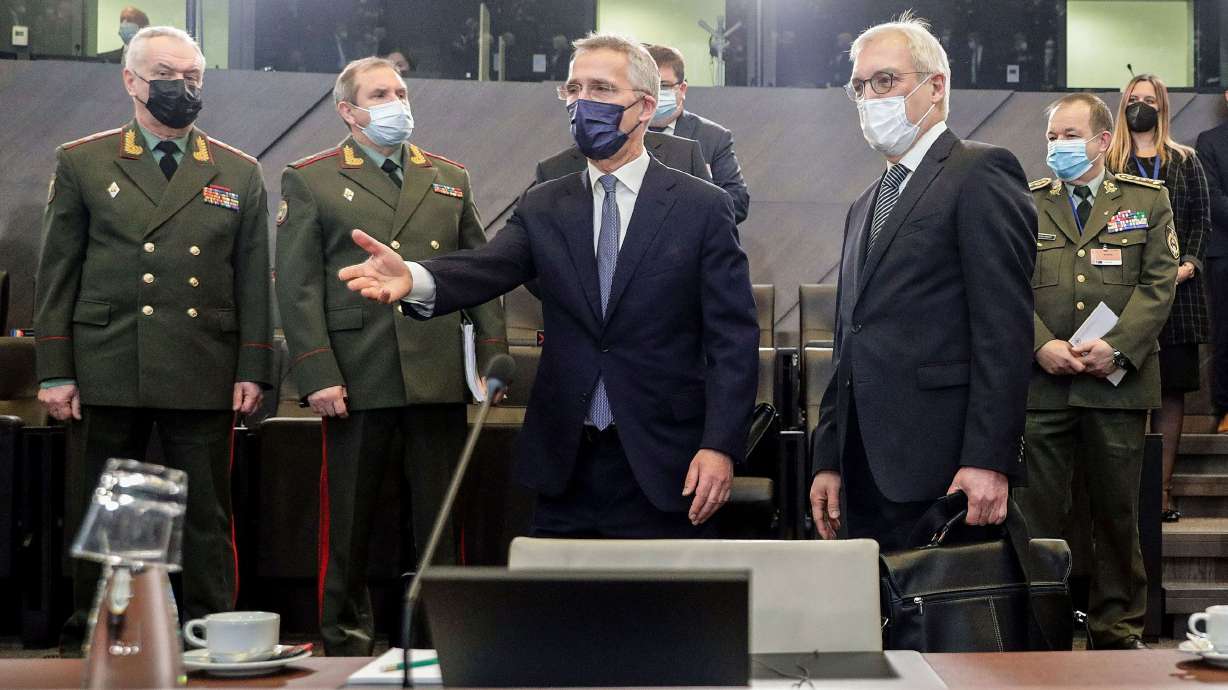 Russian Deputy Foreign Minister Alexander Grushko and NATO Secretary General Jens Stoltenberg in Brussels, Belgium, on Jan. 12, 2022. Grushko warned of impending risk, should countries support Ukraine.