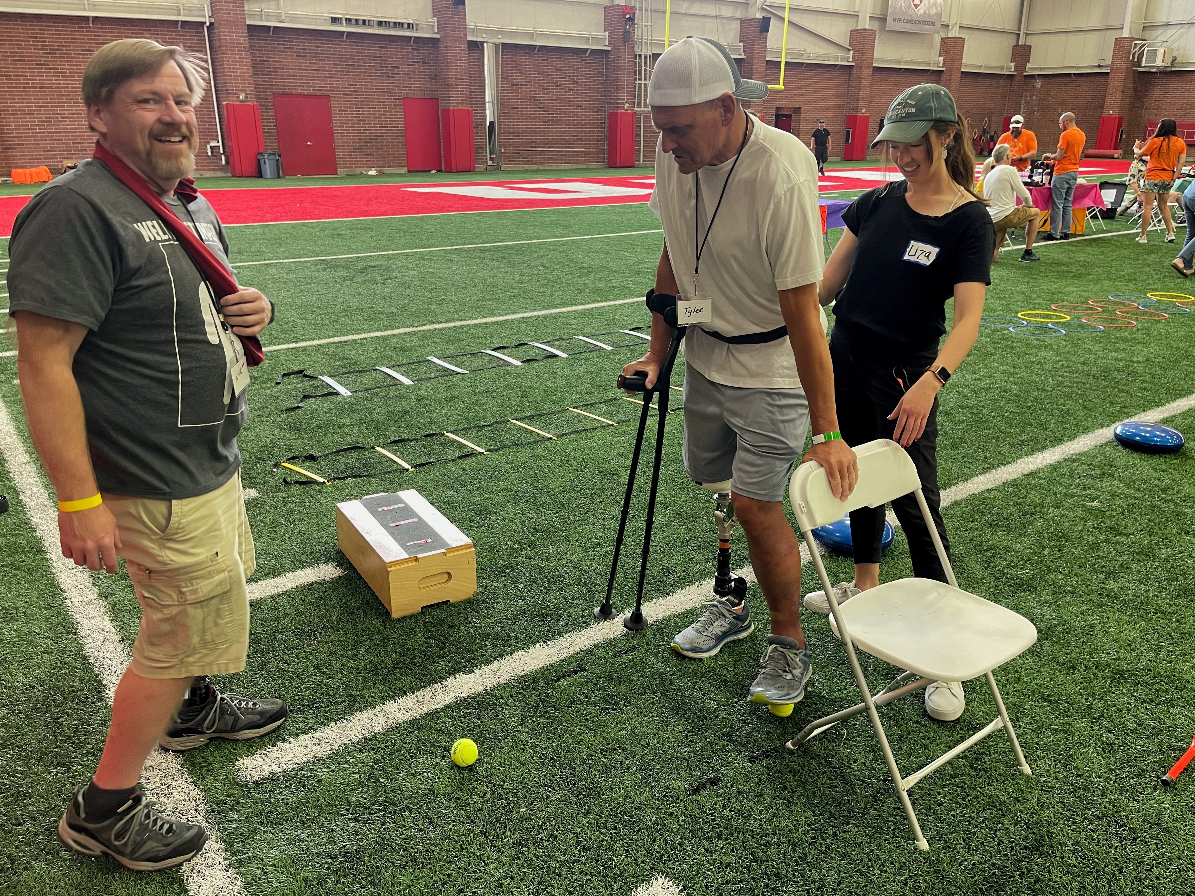 Kurt Farmer encourages a participant during the Utah Adaptive Mobility Clinic on Saturday. The clinic brought over 50 amputees to the Spence Eccles Field House in Salt Lake City to try out various prosthetics and running blades, connect with the local adaptive sports and outdoor groups and build a sense of community.