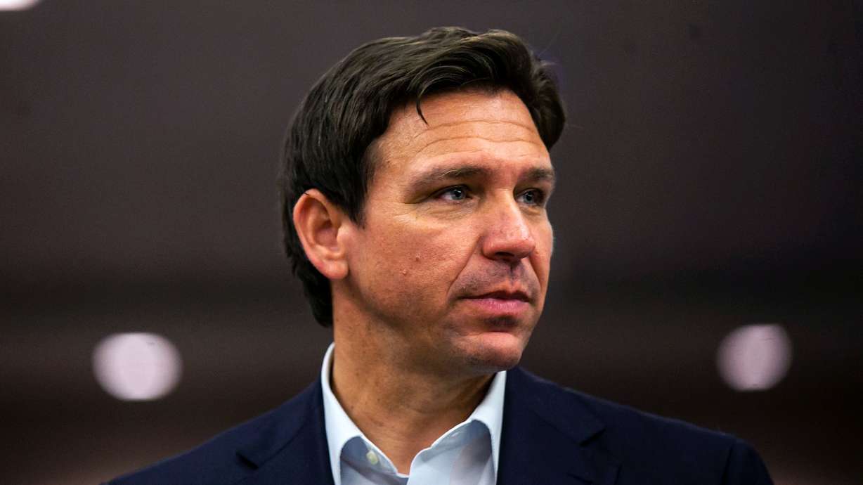 Florida Gov. Ron DeSantis appears at a reception on May 13 in Cedar Rapids, Iowa. Another advocacy group is warning people of color about traveling to Florida.