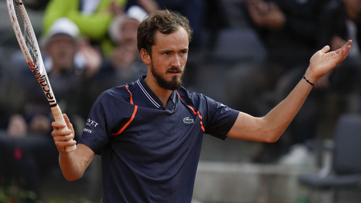 Daniil Medvedev of Russia celebrates after winning a point against Denmark's Holger Rune during the men's final tennis match at the Italian Open tennis tournament in Rome, Italy, Sunday, May 21, 2023.