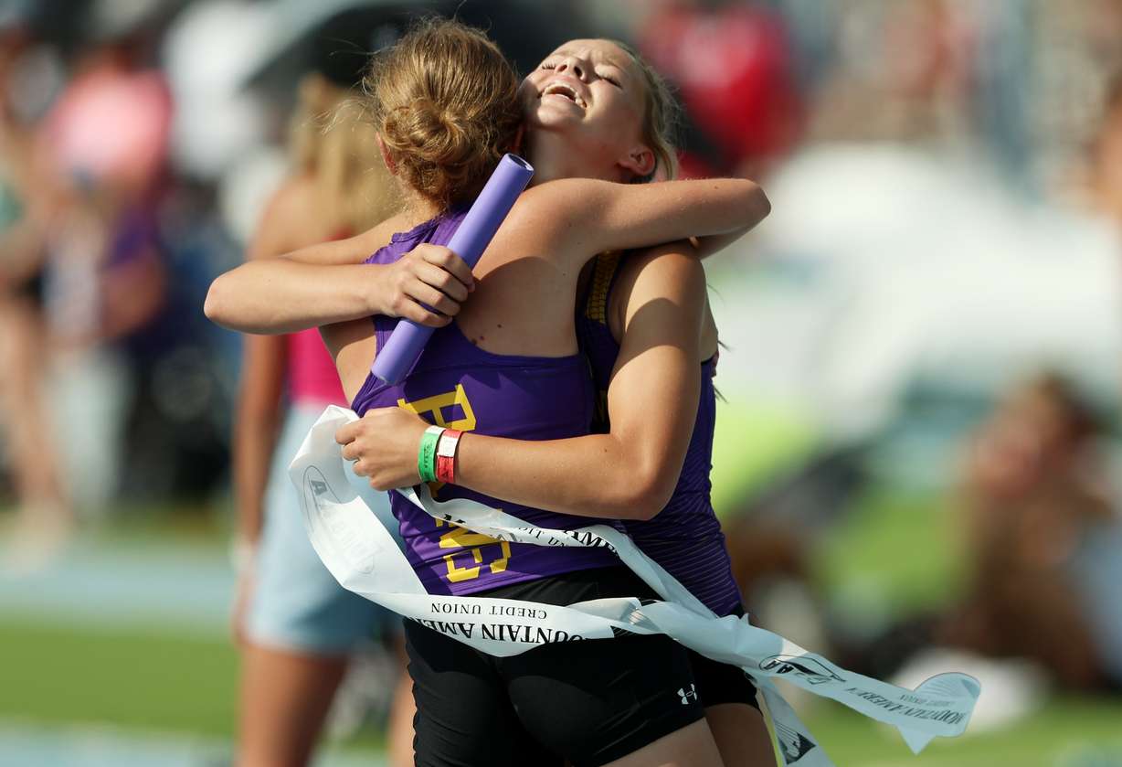 North Summit runners hug as they win the 4x400m race as High School athletes gather at BYU in Provo to compete for the state track and field championships on Saturday, May 20, 2023.