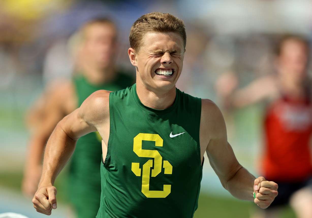 Snow Canyon’s Will Warner begins his celebration as he wins the 4A 200m race at BYU in Provo as they compete for the state track and field championships on Saturday, May 20, 2023.
