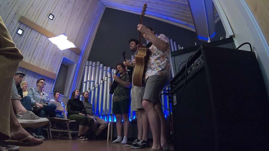 About once a month, Liz and Andrew Maxfield open the doors of what they now call the "A-frame" to the community for house concerts.