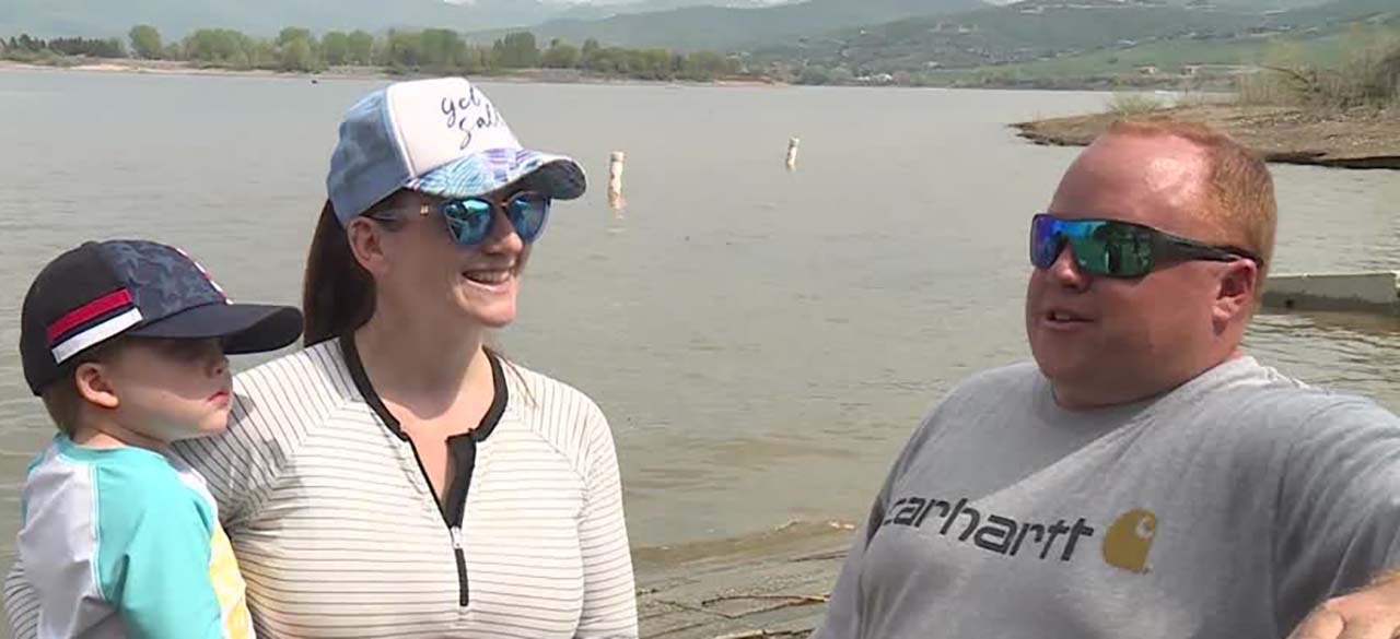 Joe and Astrid Carroll, who recently moved to Utah from Texas, talk to KSL at Pineview Reservoir on Sunday. The reservoir is up 20% from a couple of weeks ago.